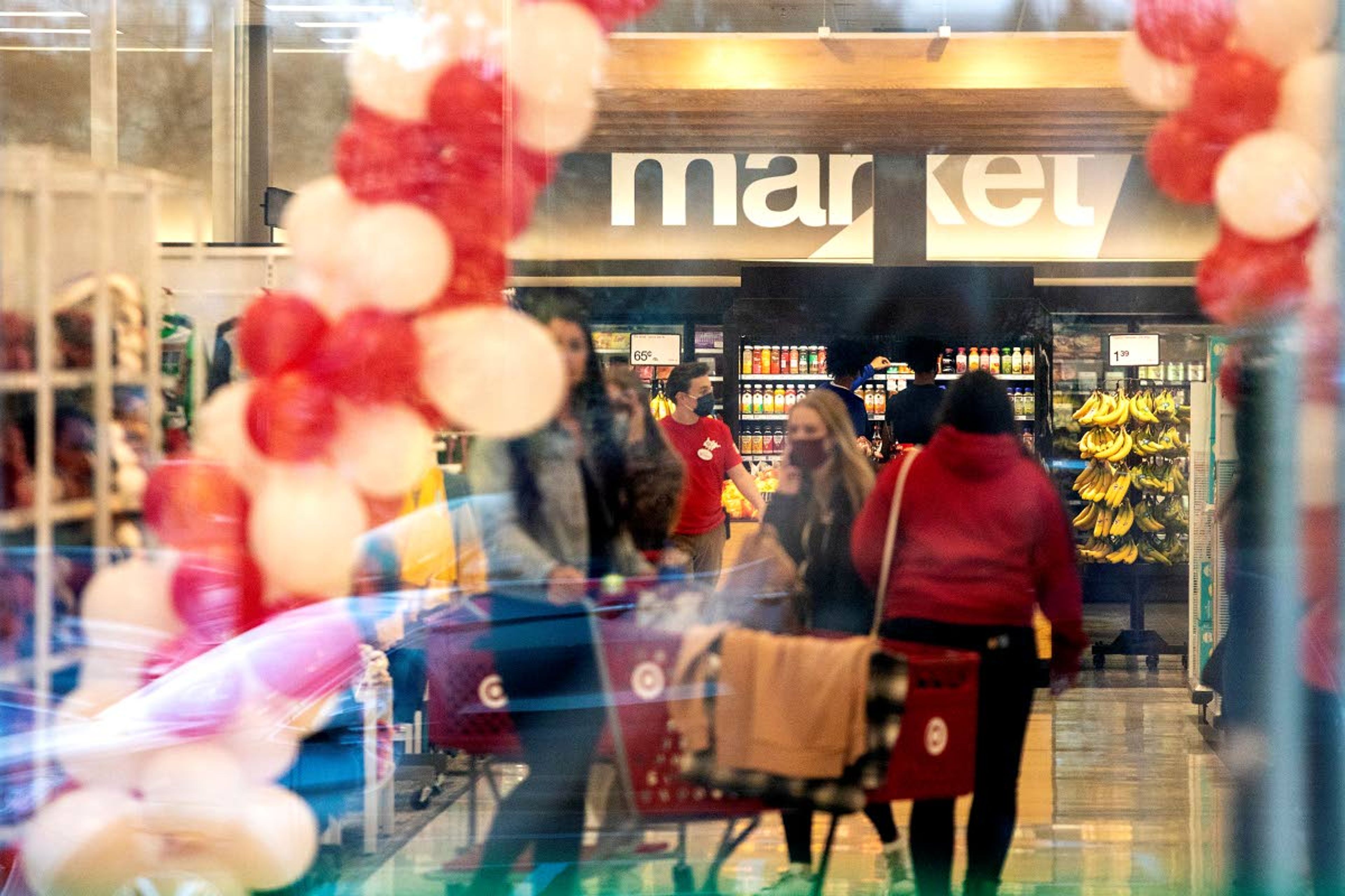 People move about inside the new Target in Moscow on Tuesday.