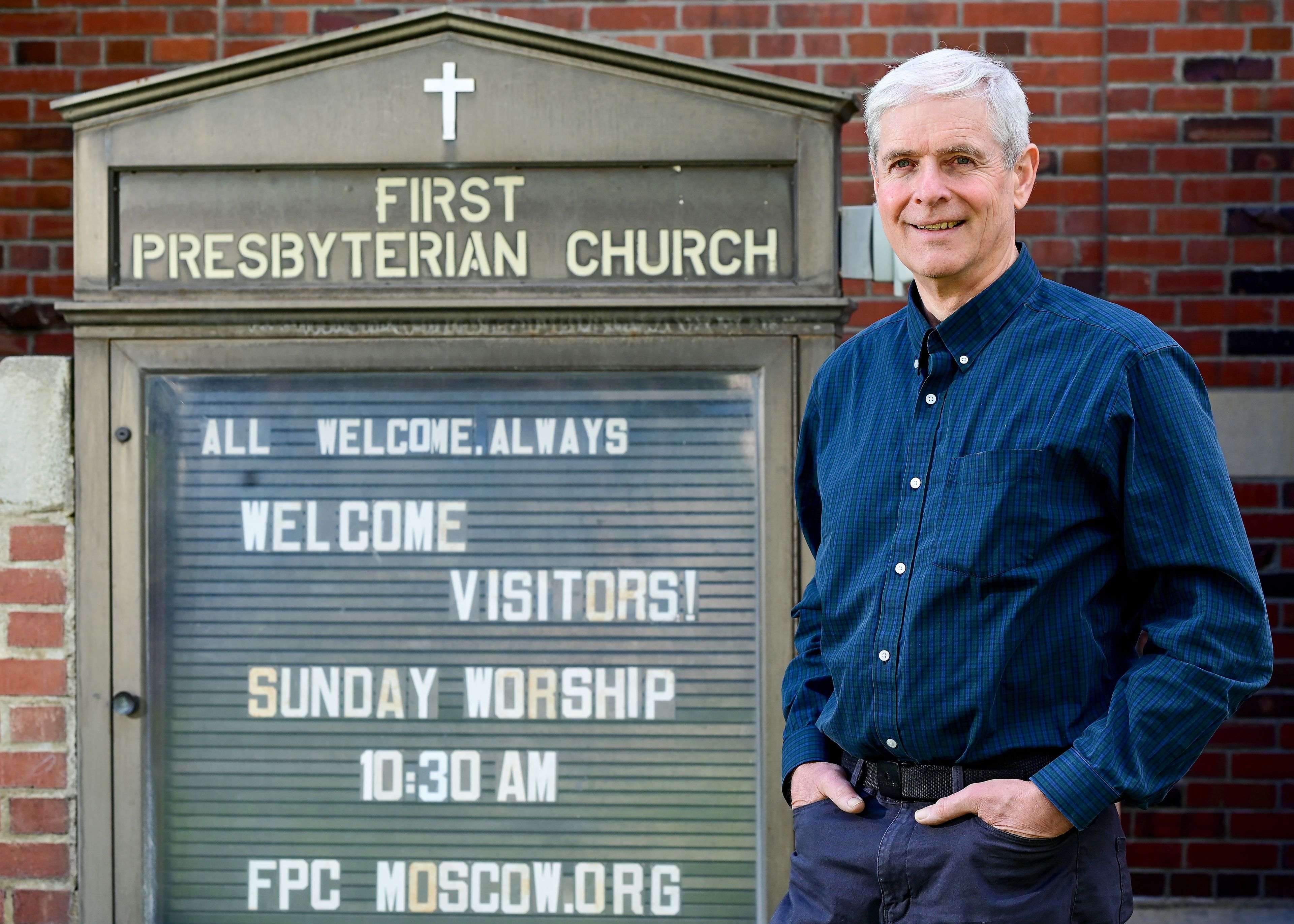 Retiring First Presbyterian Church pastor Norman Fowler stands outside of the church in Moscow on Wednesday.