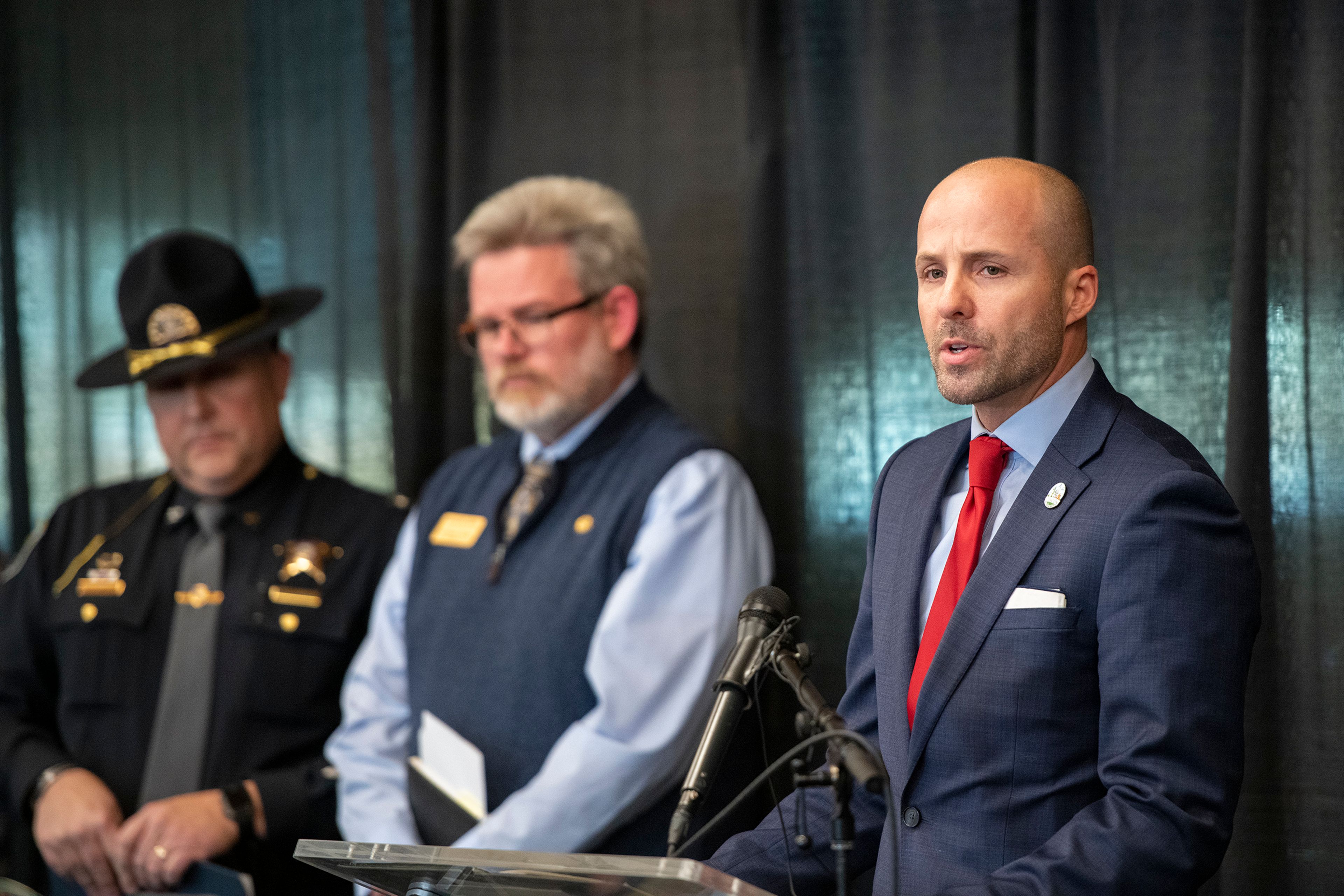 Deputy City Supervisor Tyler Palmar speaks on behalf of Gov. Brad Little at a press conference about a quadruple homicide investigation involving four University of Idaho students at the Idaho Central Credit Union Arena on Wednesday in Moscow.