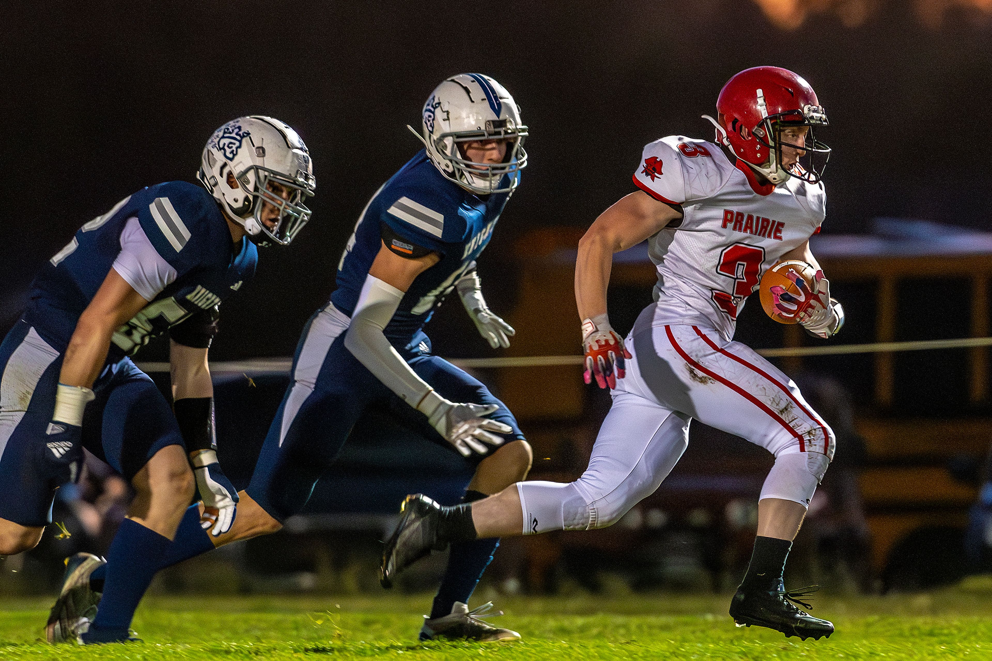 Prairie Dylan Uhlenkott runs the ball against Logos during a conference game Friday in Moscow.,