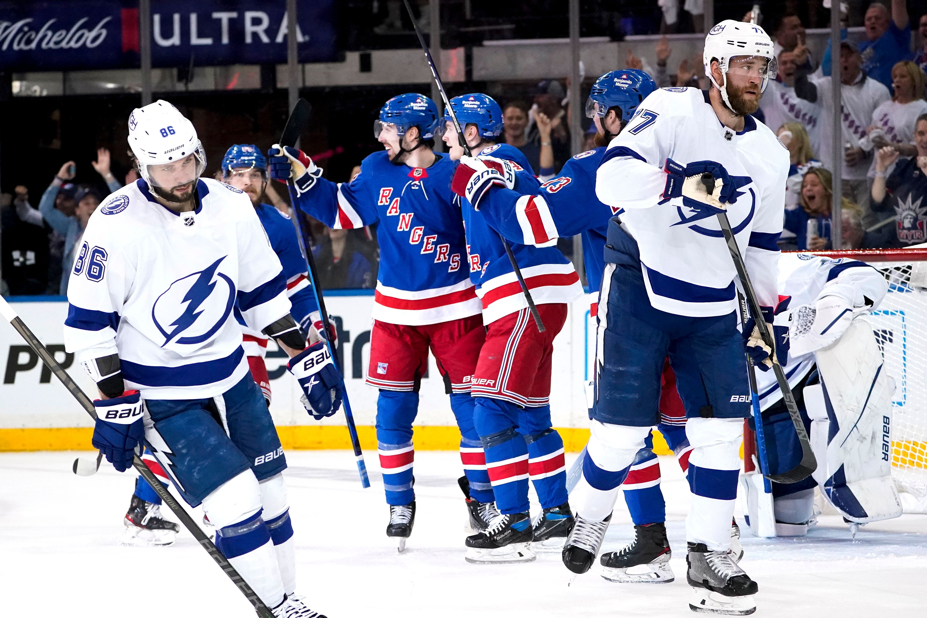 Tampa Bay Lightning defenseman Victor Hedman (77) and right wing Nikita Kucherov (86) react after New York Rangers right wing Kaapo Kakko (24) scores on goaltender Andrei Vasilevskiy (88) in the first period of Game 2 of the NHL hockey Stanley Cup playoffs Eastern Conference finals, Friday, June 3, 2022, in New York. (AP Photo/John Minchillo)