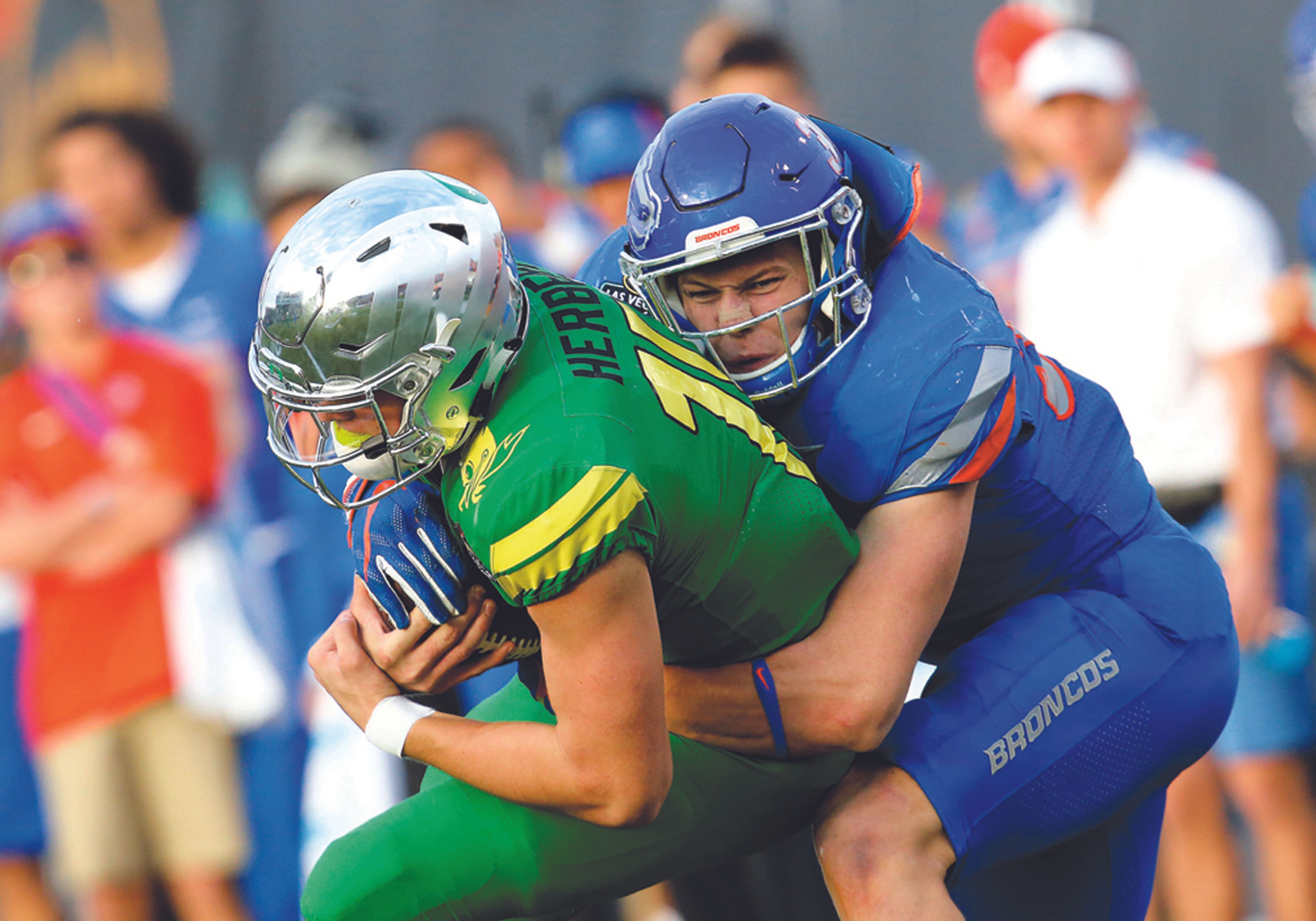 Boise State linebacker Leighton Vander Esch (38) tackles Oregon quarterback Justin Herbert (10) during the second half of the Las Vegas Bowl on Saturday, Dec. 16, 2017, in Las Vegas.