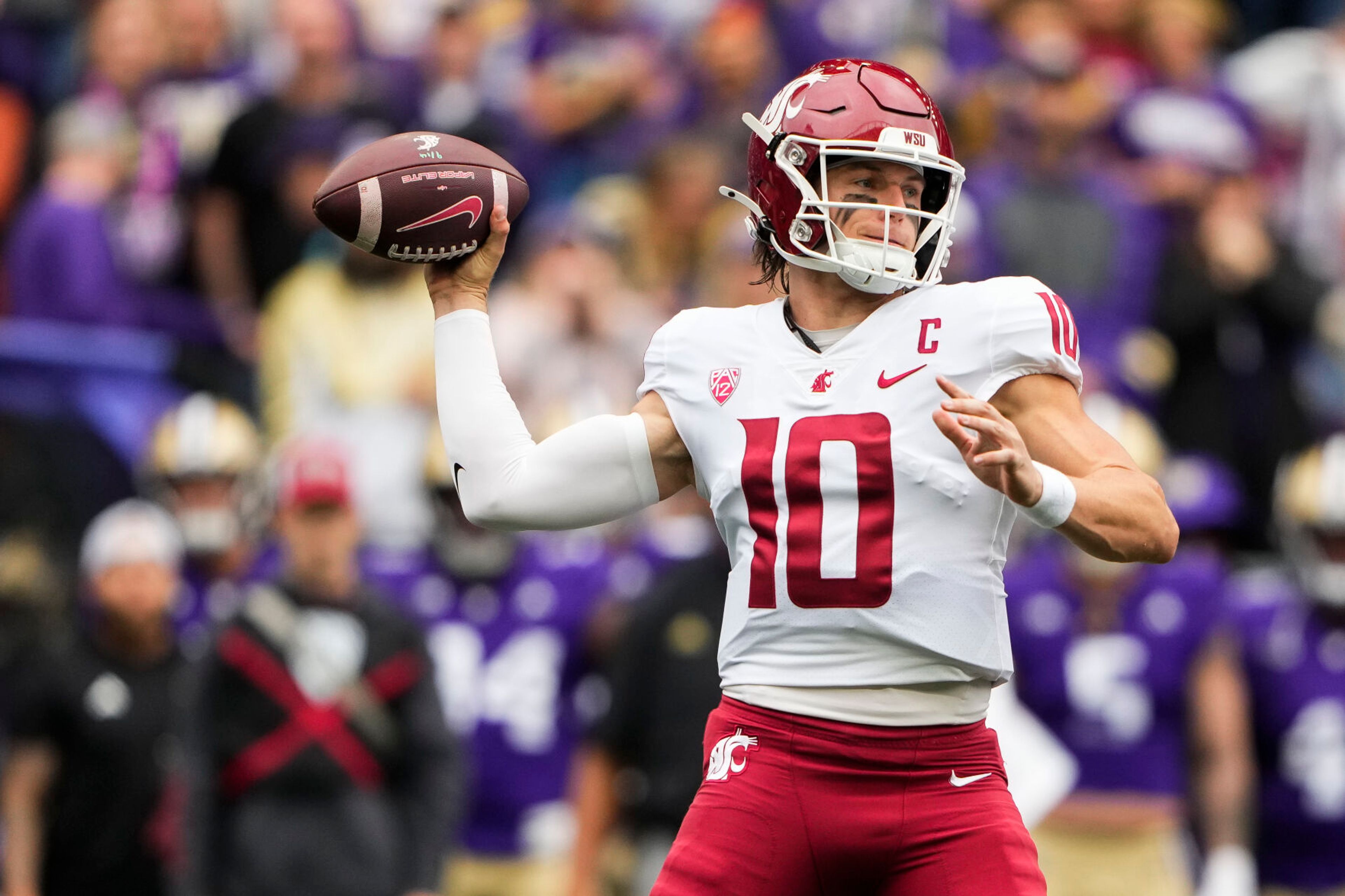 Washington State quarterback John Mateer (10) throws against Washington during the first half of an NCAA college football game Saturday, Sept. 14, 2024, in Seattle. (AP Photo/Lindsey Wasson)