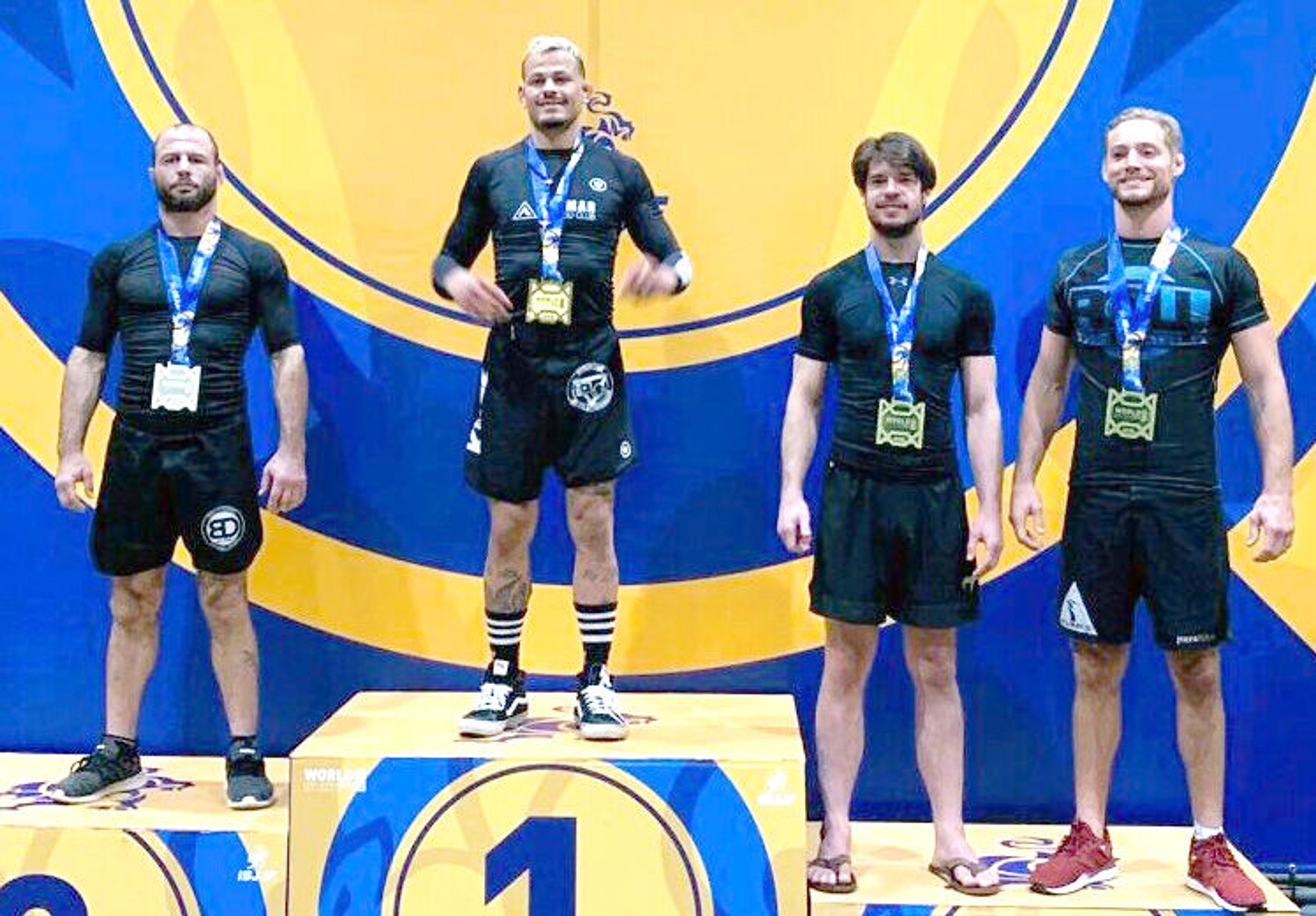 Mike Piekarski, second from right, of Pullman, placed third in the world Friday at the International Brazilian Jiu Jitsu Federation World Championship No Gi competition in Anaheim, Calif. Piekarski, a black belt in Brazilian Jiu Jitsu at V7 Brazilian Jiu Jitsu, competed in the Black Belt Master 2 Middleweight division. He is a physical therapist for Pullman Regional Hospital.