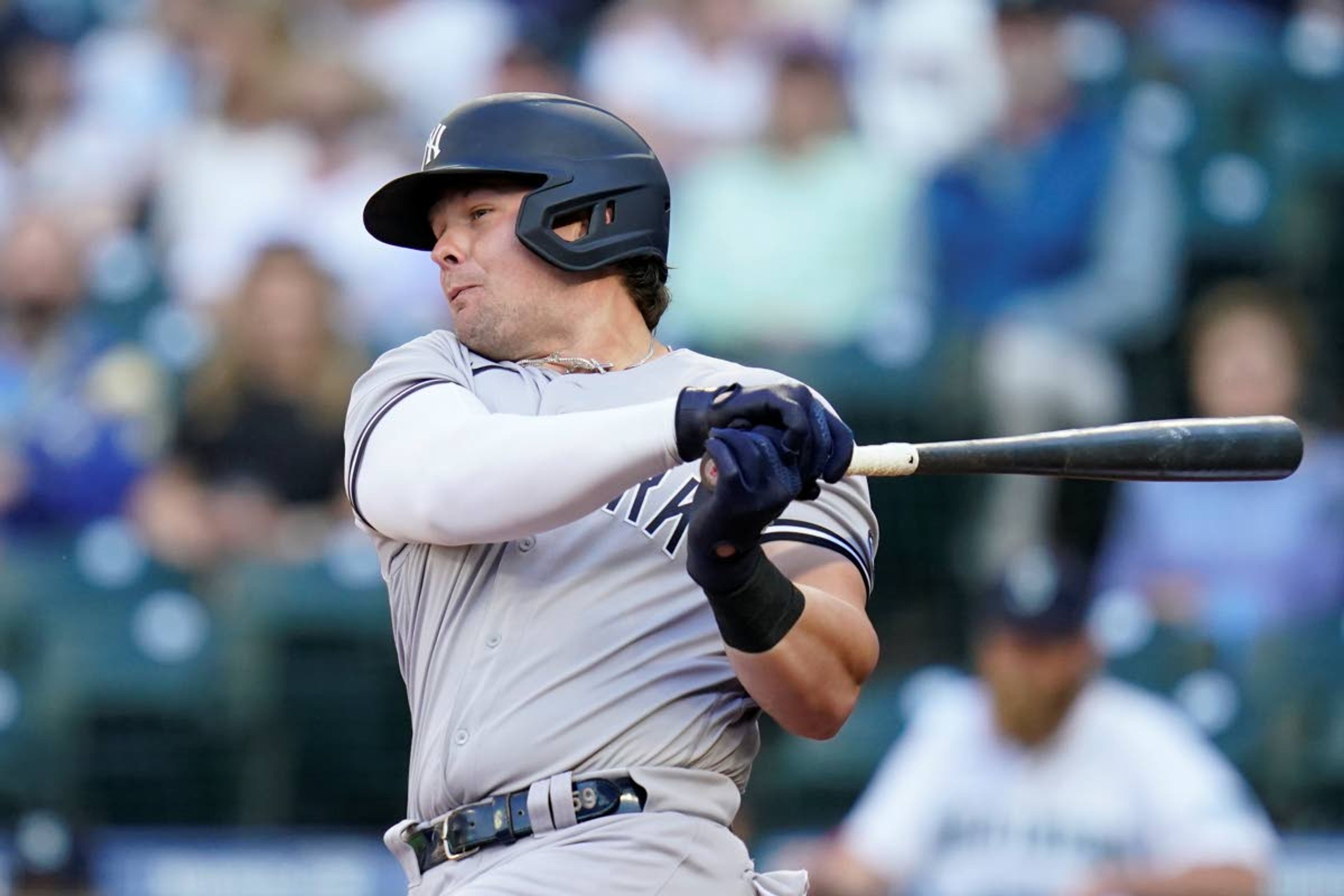 New York Yankees' Luke Voit singles in a run against the Seattle Mariners during the first inning of a baseball game Wednesday, July 7, 2021, in Seattle. (AP Photo/Elaine Thompson)