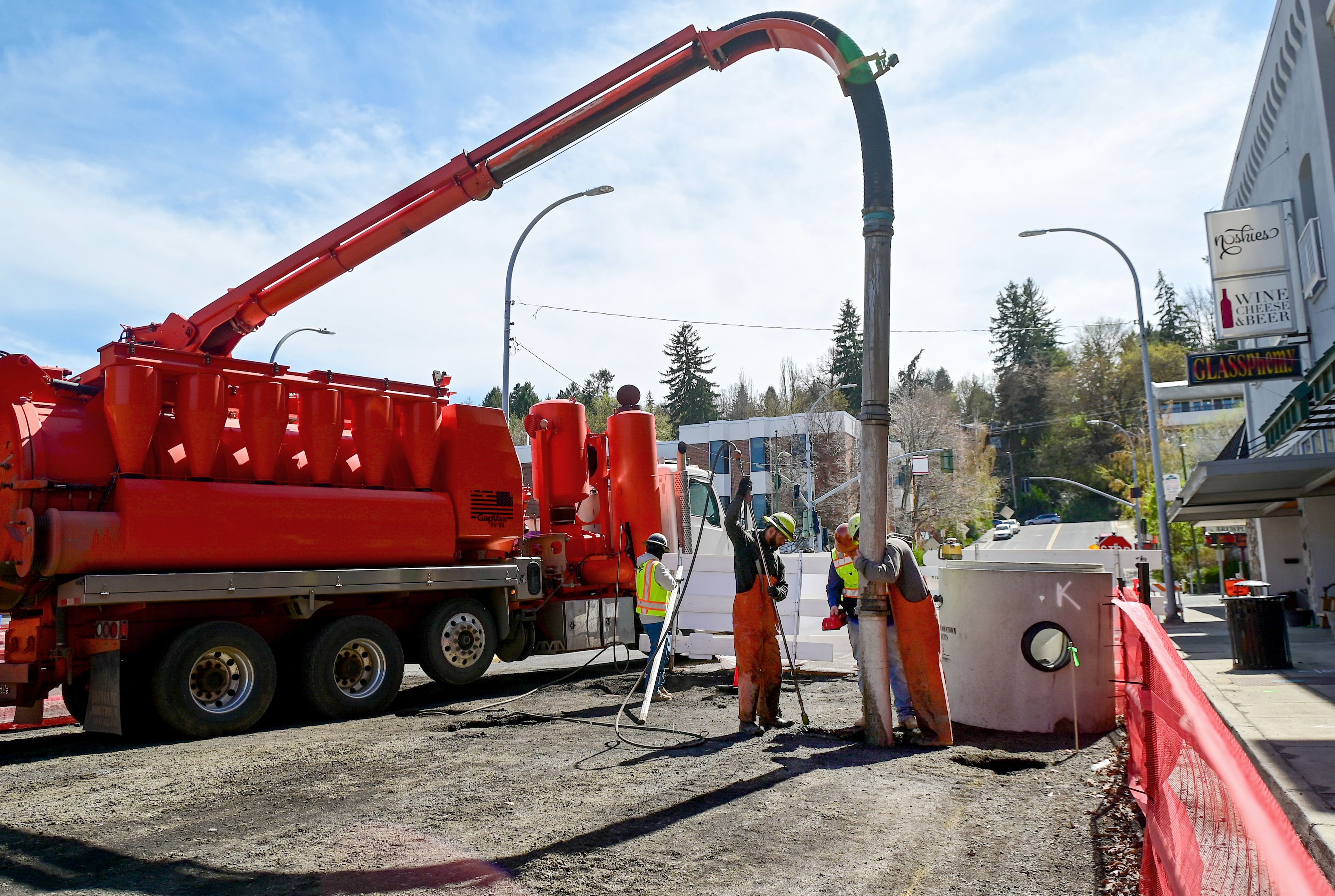 A crew uses a water excavator to locate main lines under Kamiaken Street in downtown Pullman on Monday, April 15, 2024.