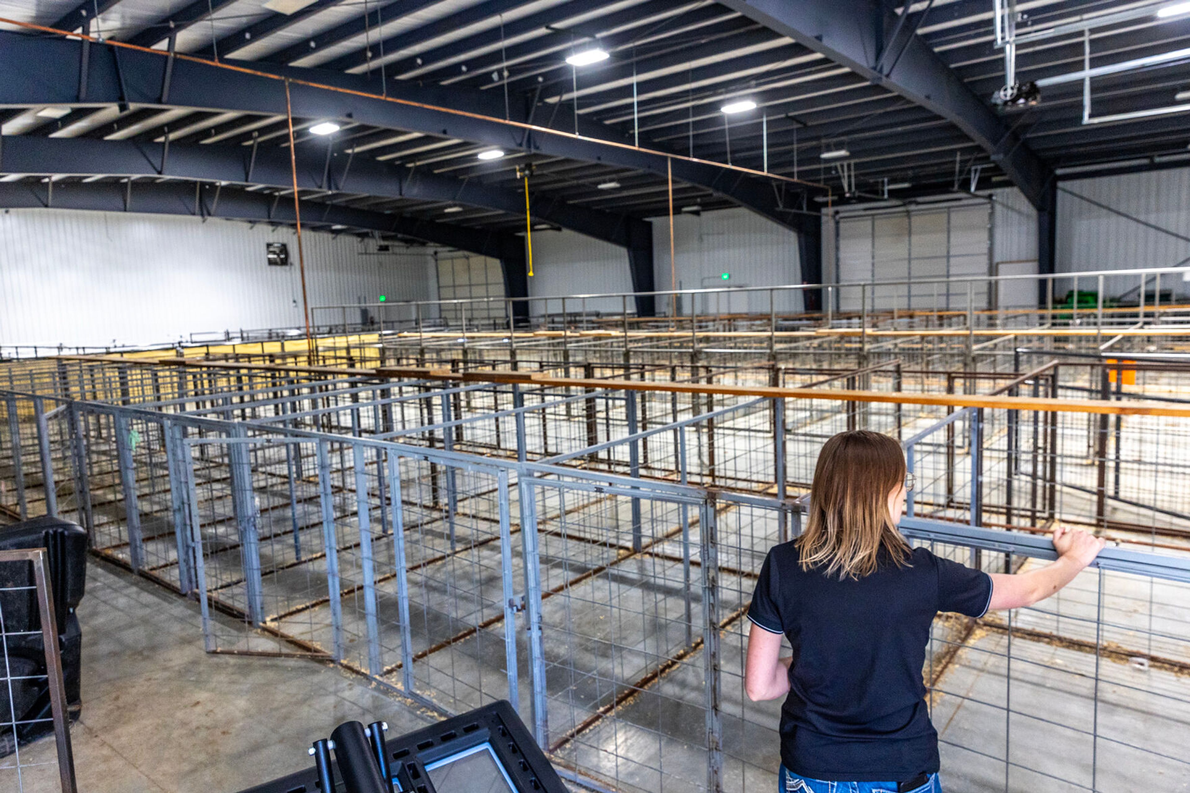 Klae O’Brien walks through the new barn Wednesday at the Lewis County Fairgrounds in Nezperce.