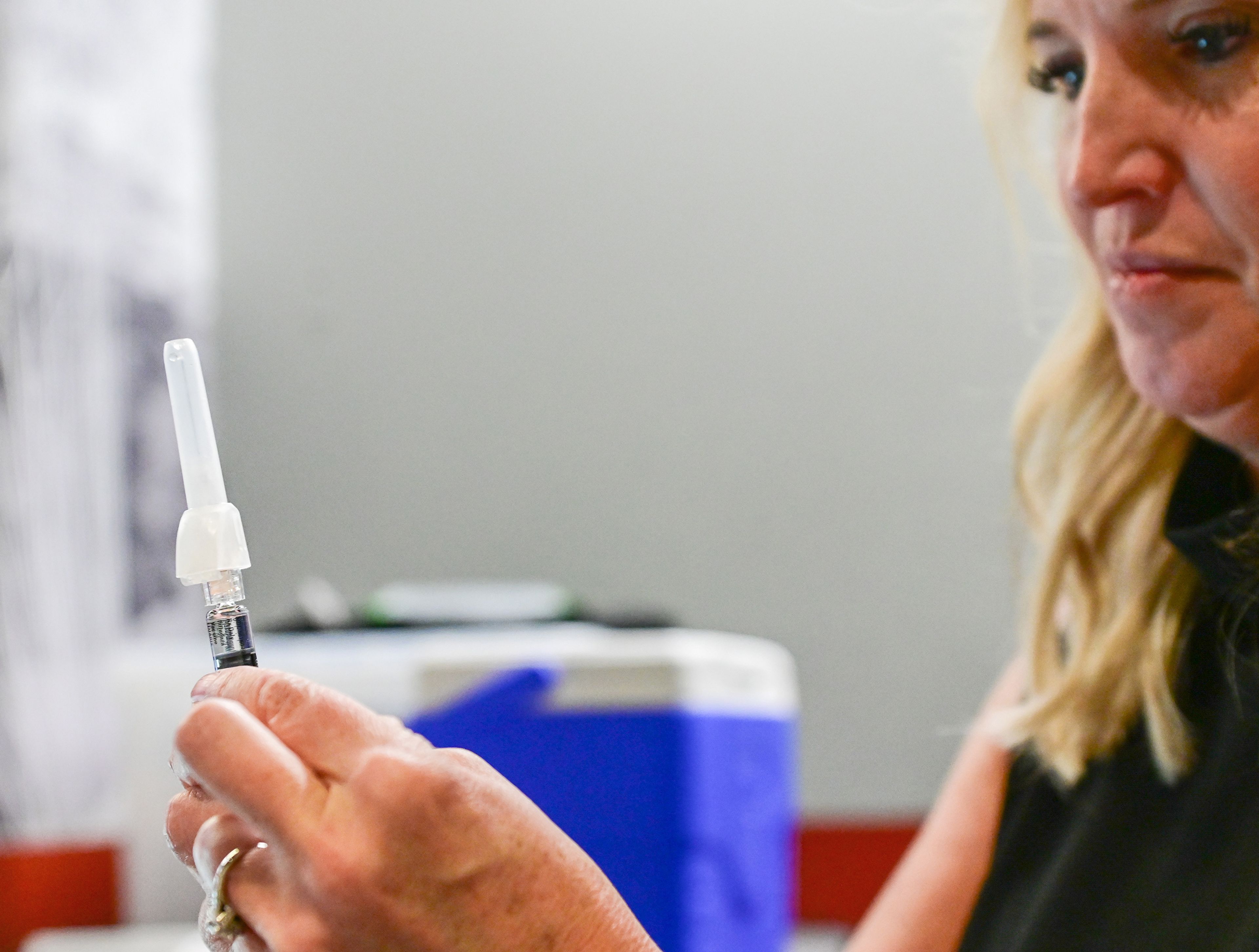 Chris Boyd, manager of Nursing Services at Cougar Health Services, prepares flu vaccines for students Friday at the first Flu Shot Friday clinic on Washington State University campus in Pullman.