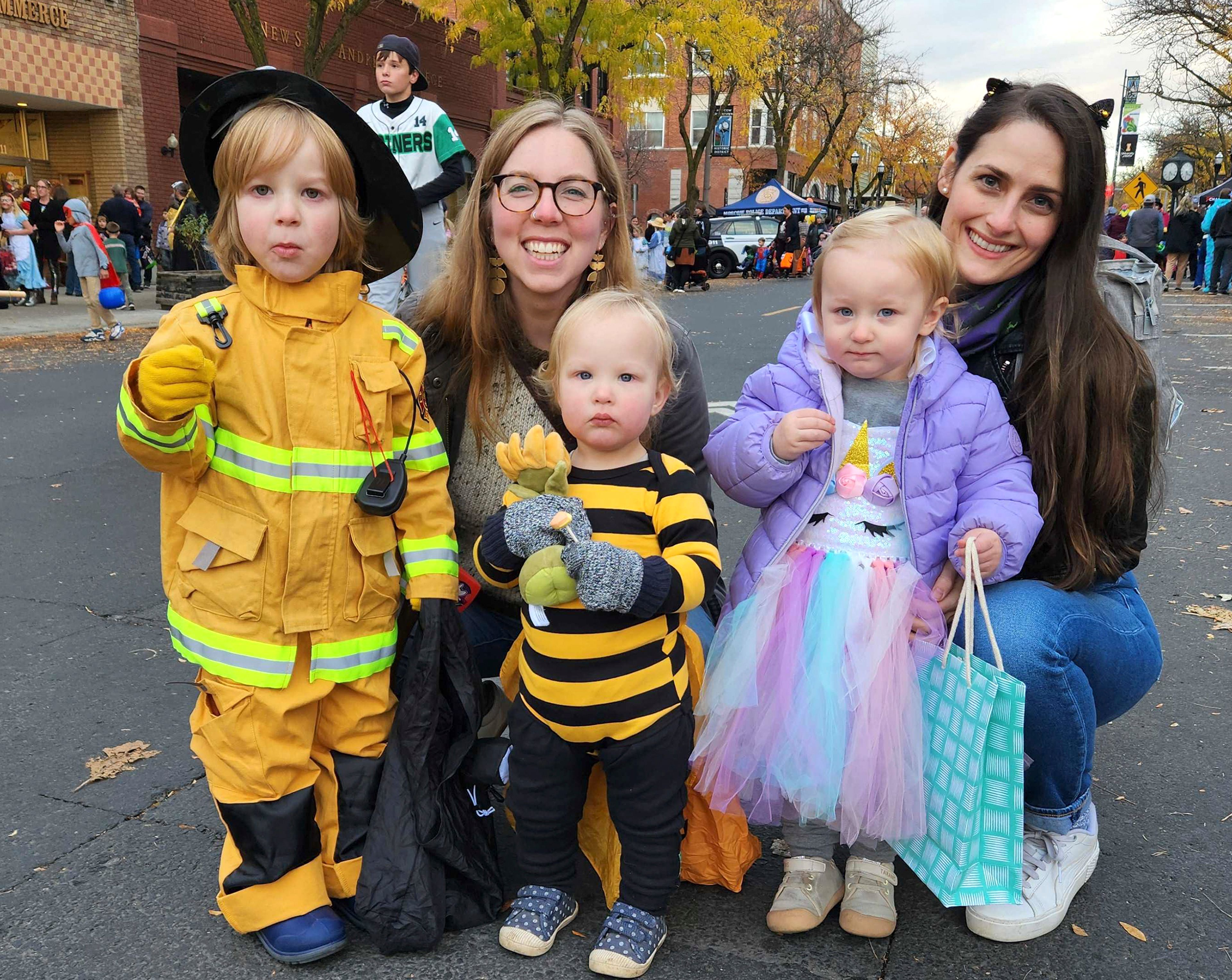 Soren Reed, from left, Corinne Reed, Inneke Reed, Sofie Lange and Michelle Lange attend Moscow's Downtown Trick or Treat event Thursday.