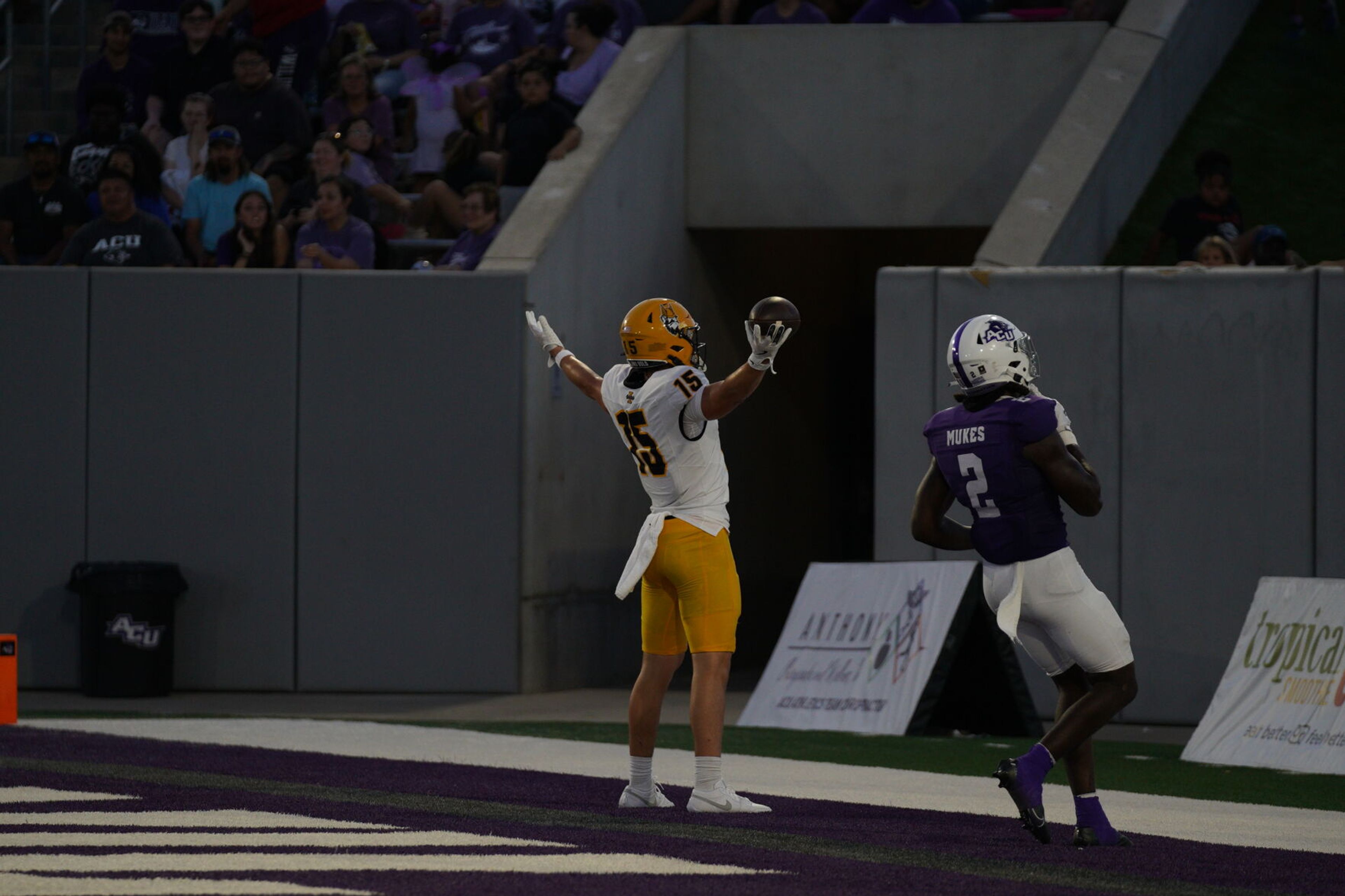 Idaho wide receiver Mark Hamper, left, celebrates a touchdown next to Abilene Christian defensive back Jordan Mukes during a game Saturday, Sept. 21, in Abilene, Texas.