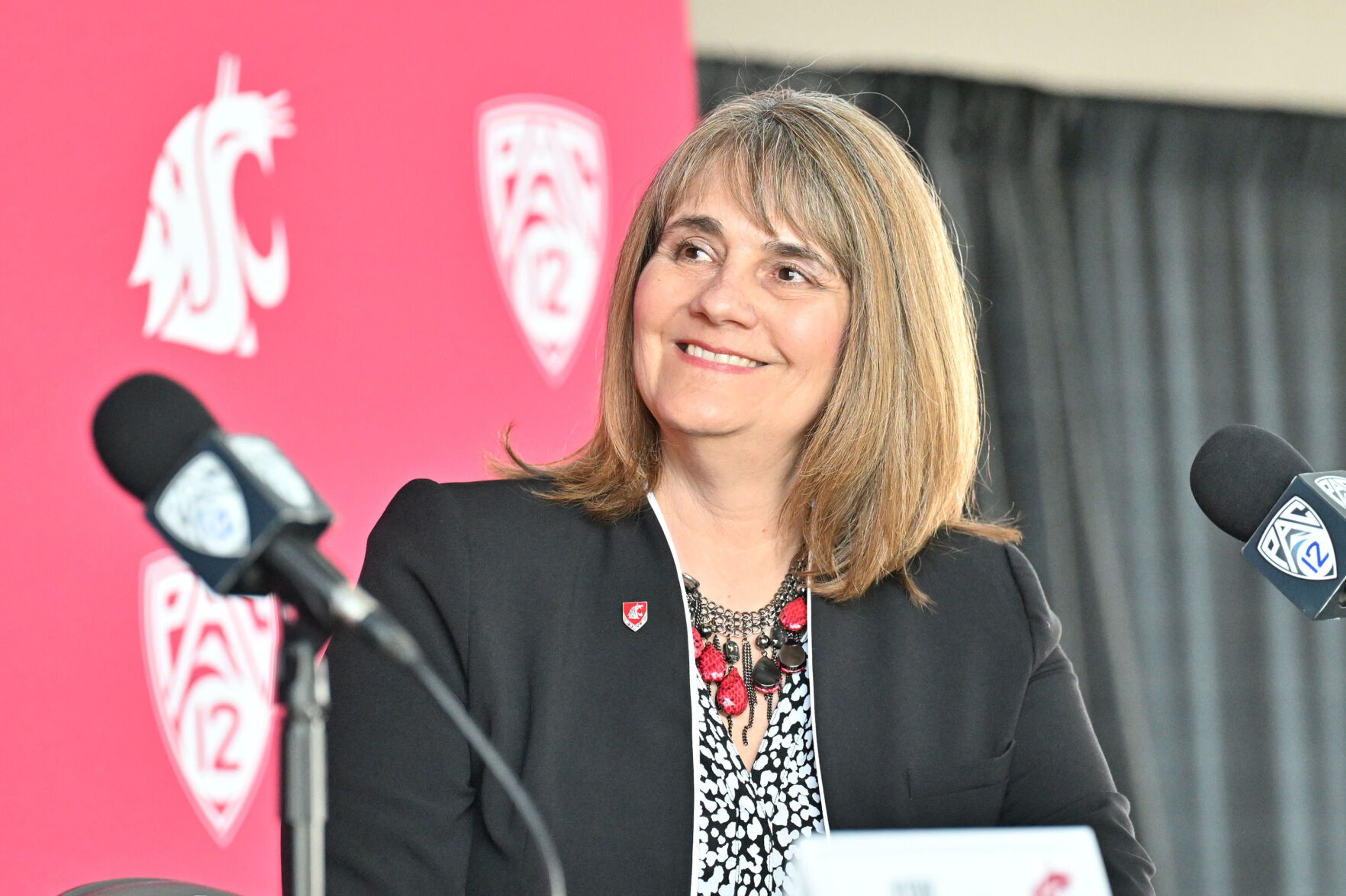 Washington State athletic director Anne McCoy reacts during her introductory news conference Tuesday, July 16, at Gesa Field in Pullman.