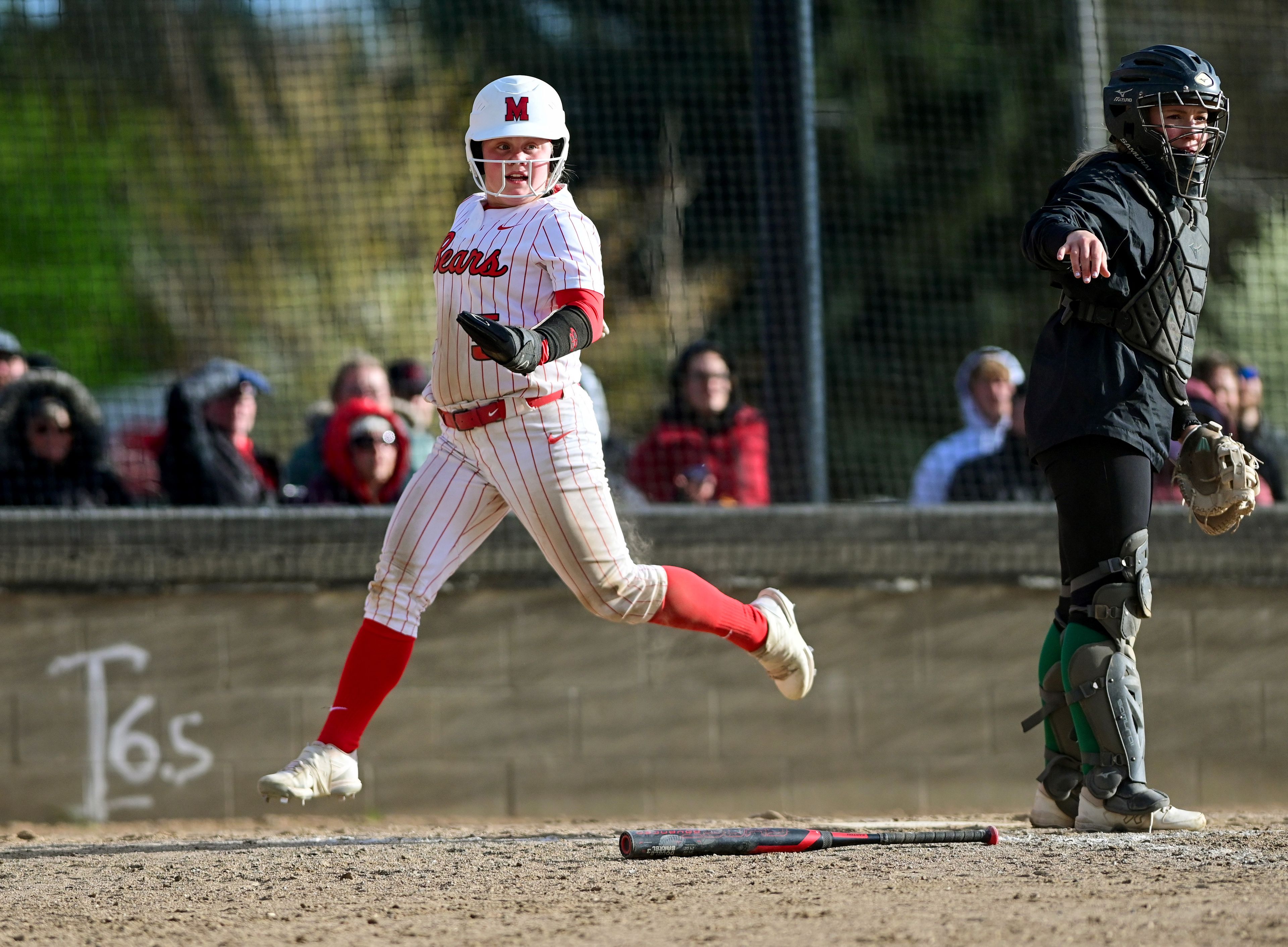 Moscow’s Addie Branen (5) runs through home plate during Tuesday's game against Lakeland in Moscow.