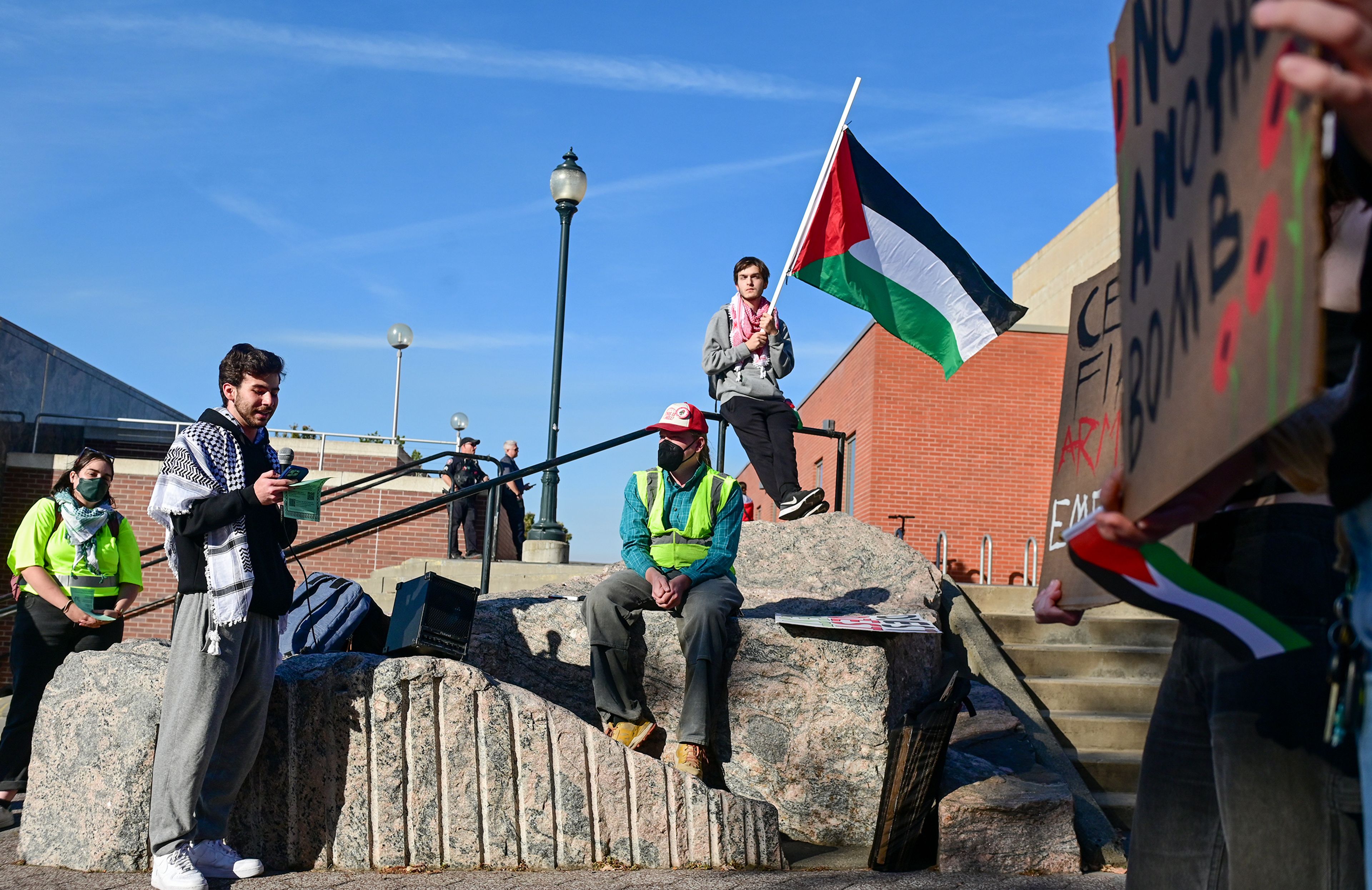 Khalid Abualtin, front, a Washington State University student, speaks to a group gathered for a solidarity for Palestine rally on the Washington State University campus Monday in Pullman.