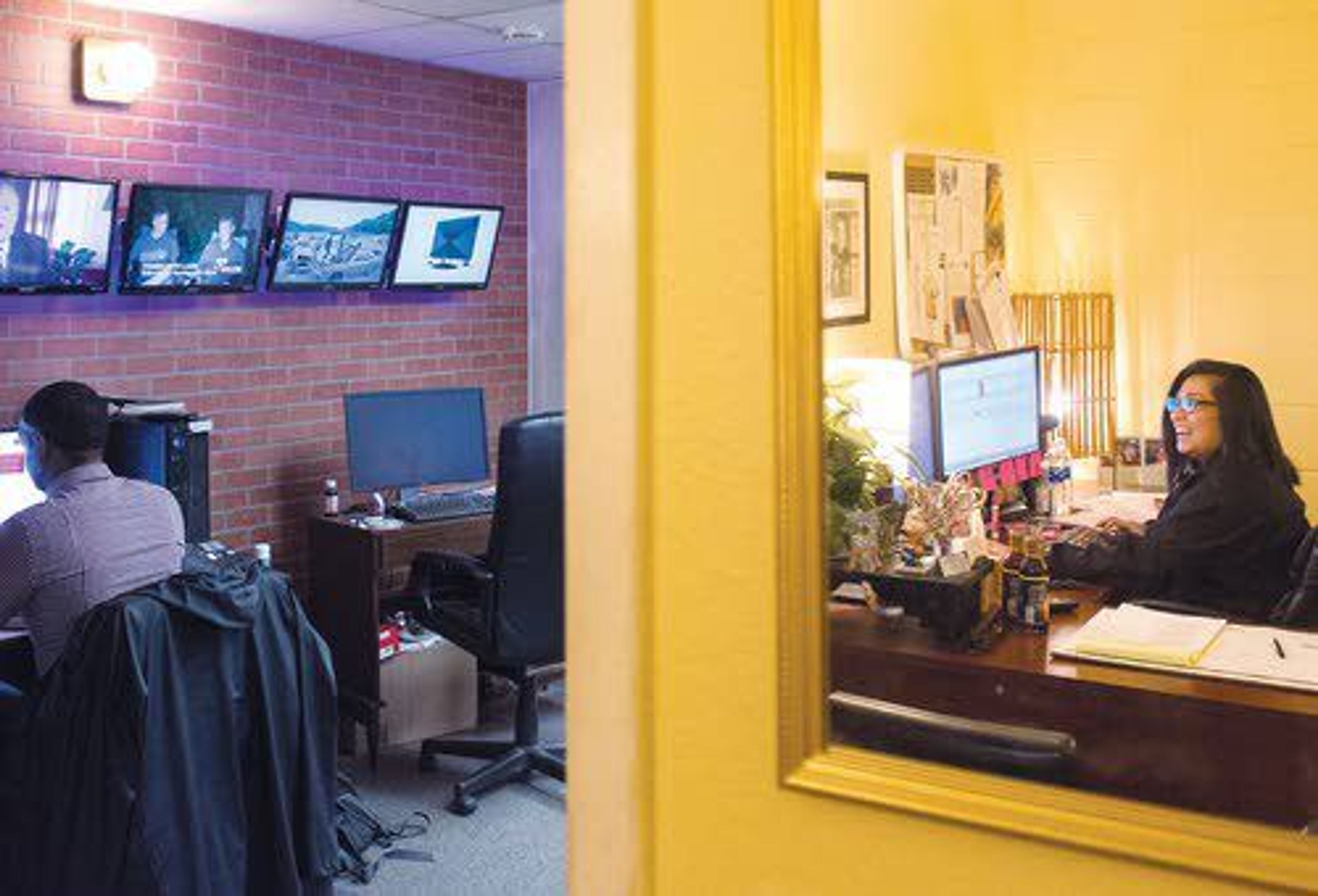 KLEW Anchor and News Director Anna Velasquez sits in her office preparing the evening news broadcast schedule, while another KLEW employee gets stories ready in the newsroom in Lewiston in this file photograph from 2018.