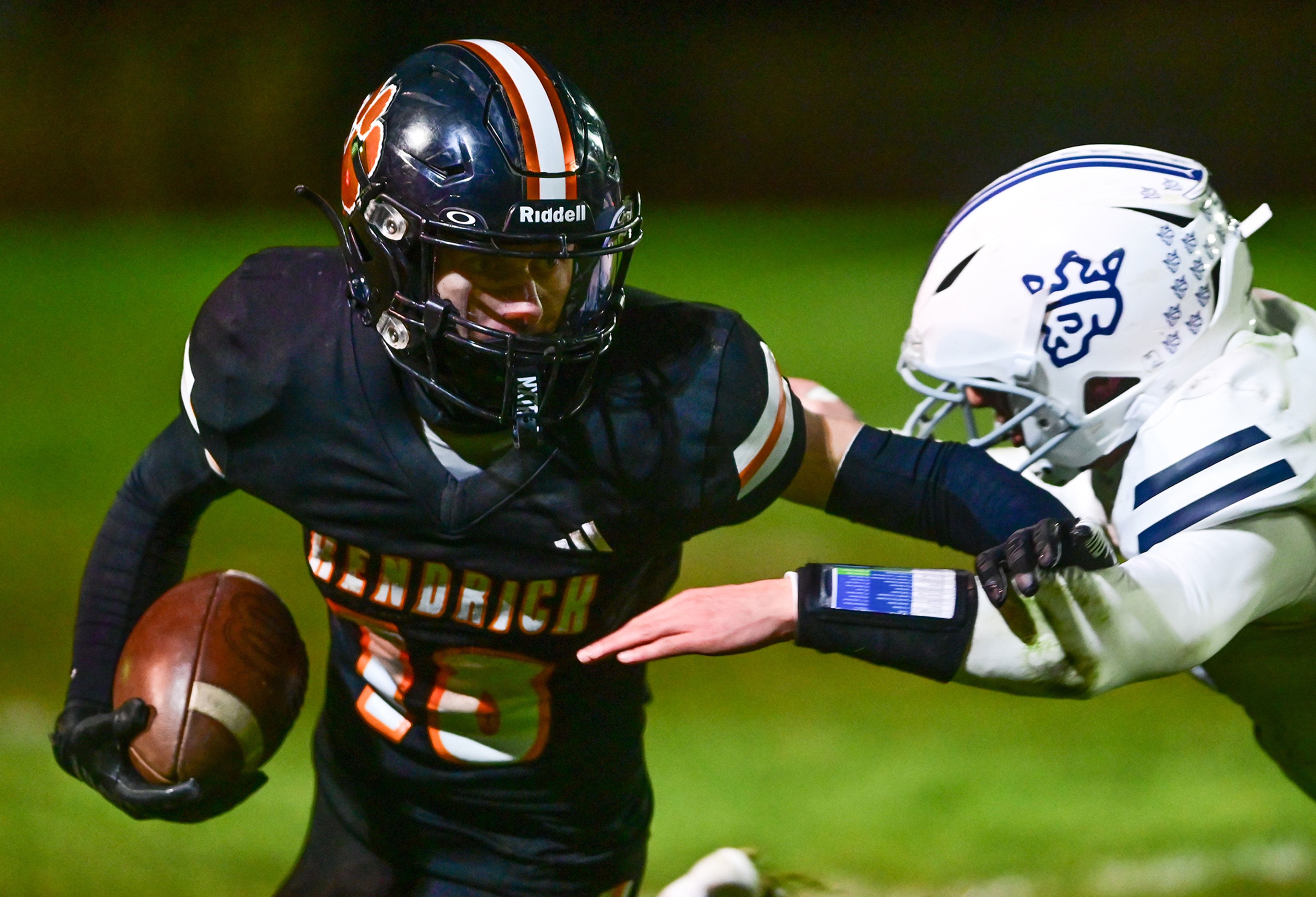 Kendricks Cade Silflow pushes against a Logos defender while carrying the ball Friday in Kendrick.,