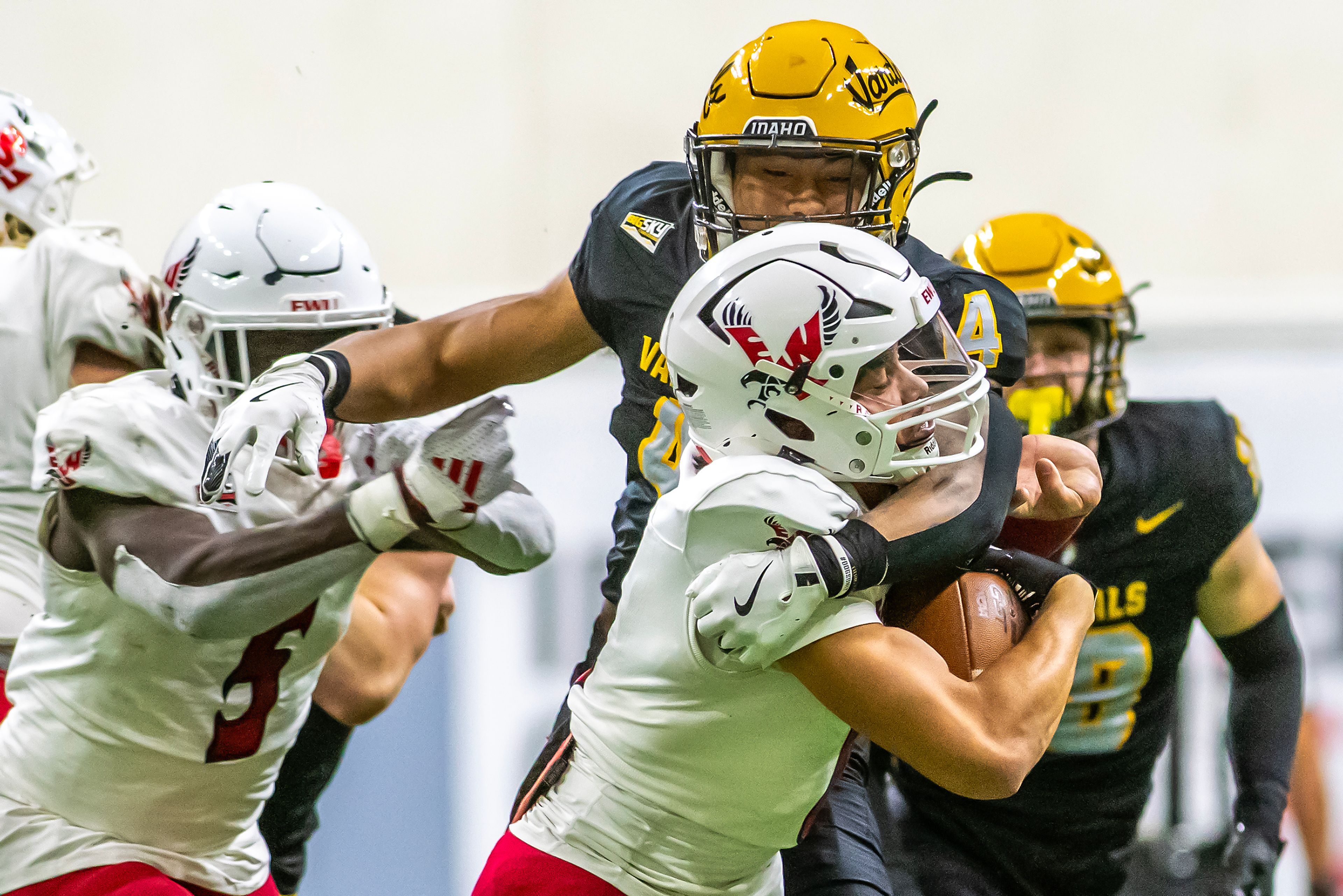 Idaho linebacker Isiah King sacks Eastern Washington quarterback Kekoa Visperas during a Big Sky game Saturday at the Kibbie Dome in Moscow. ,