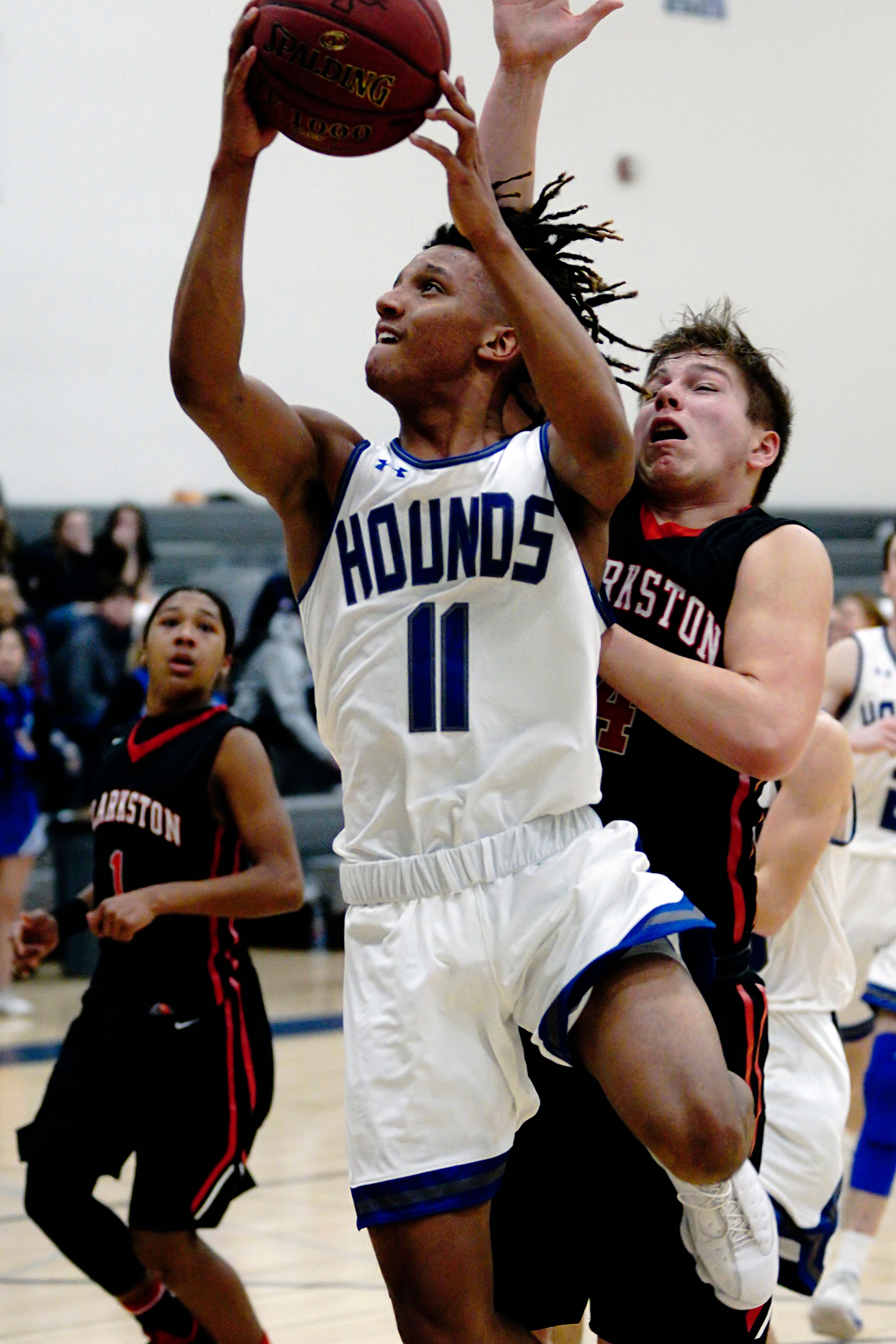 Pullman's Isaiah Strong (11) powers past Clarkston's Gus Hagestad for a shot Friday night.