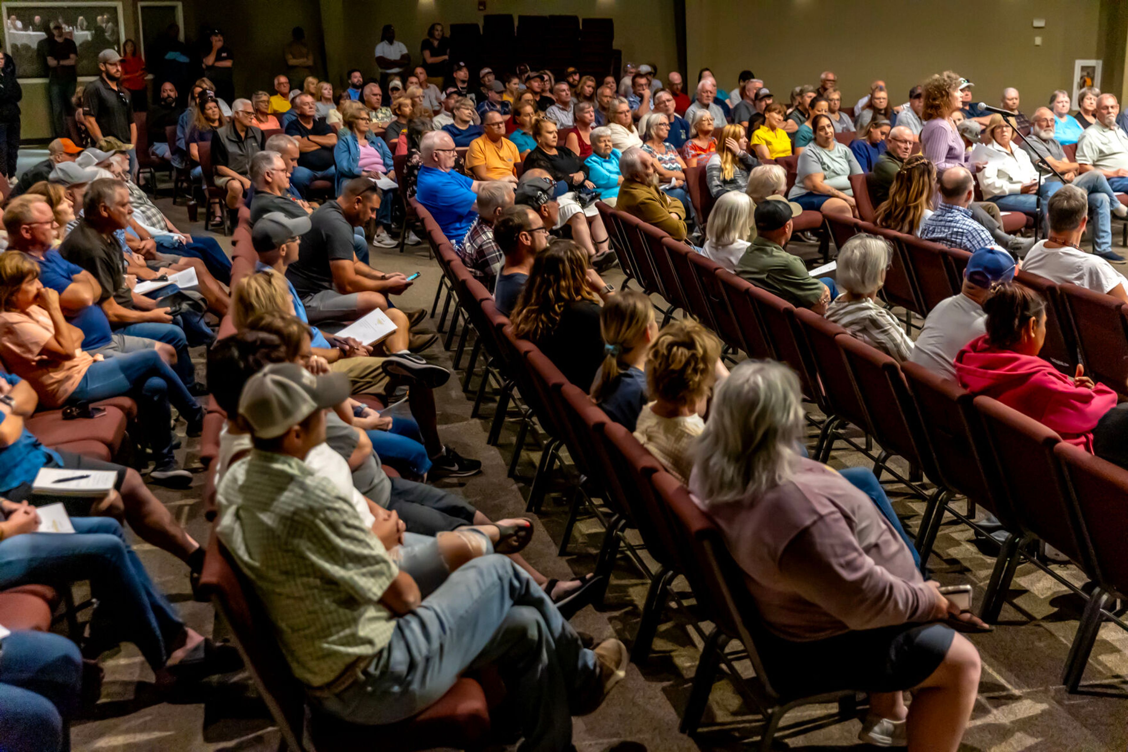 People sit at the Asotin County Fire Department for a town hall Tuesday in Clarkston.