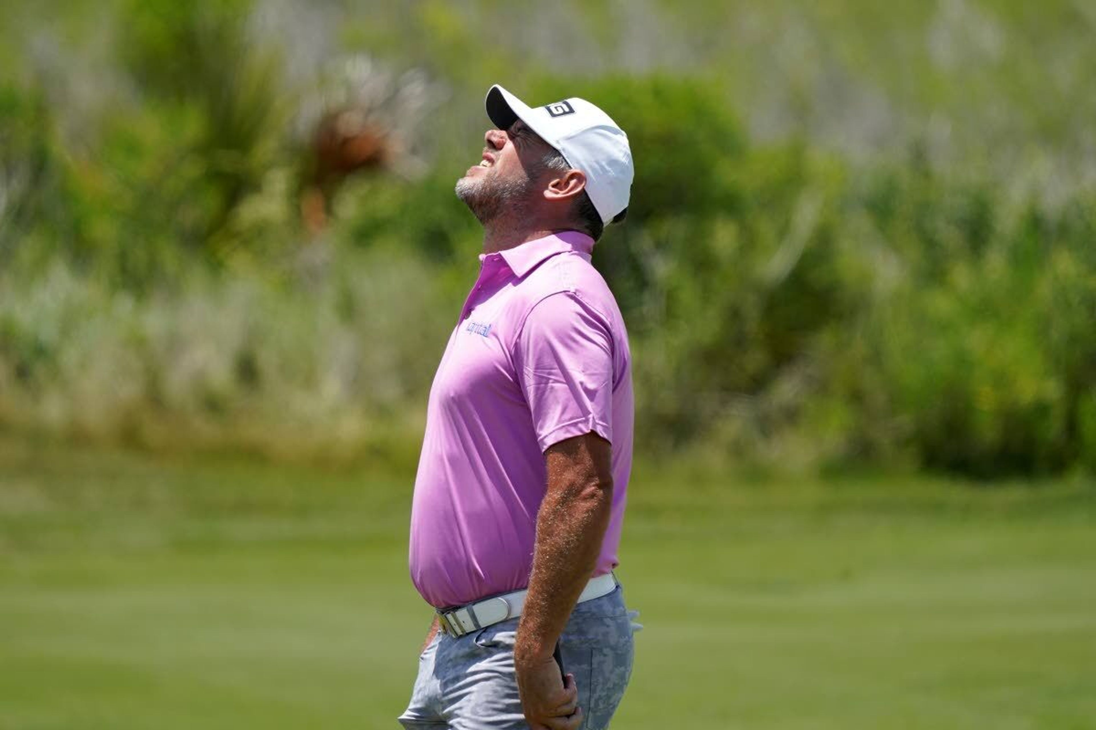 Lee Westwood, of England, reacts after a miss on the fourth green during the third round at the PGA Championship golf tournament on the Ocean Course, Saturday, May 22, 2021, in Kiawah Island, S.C. (AP Photo/Matt York)