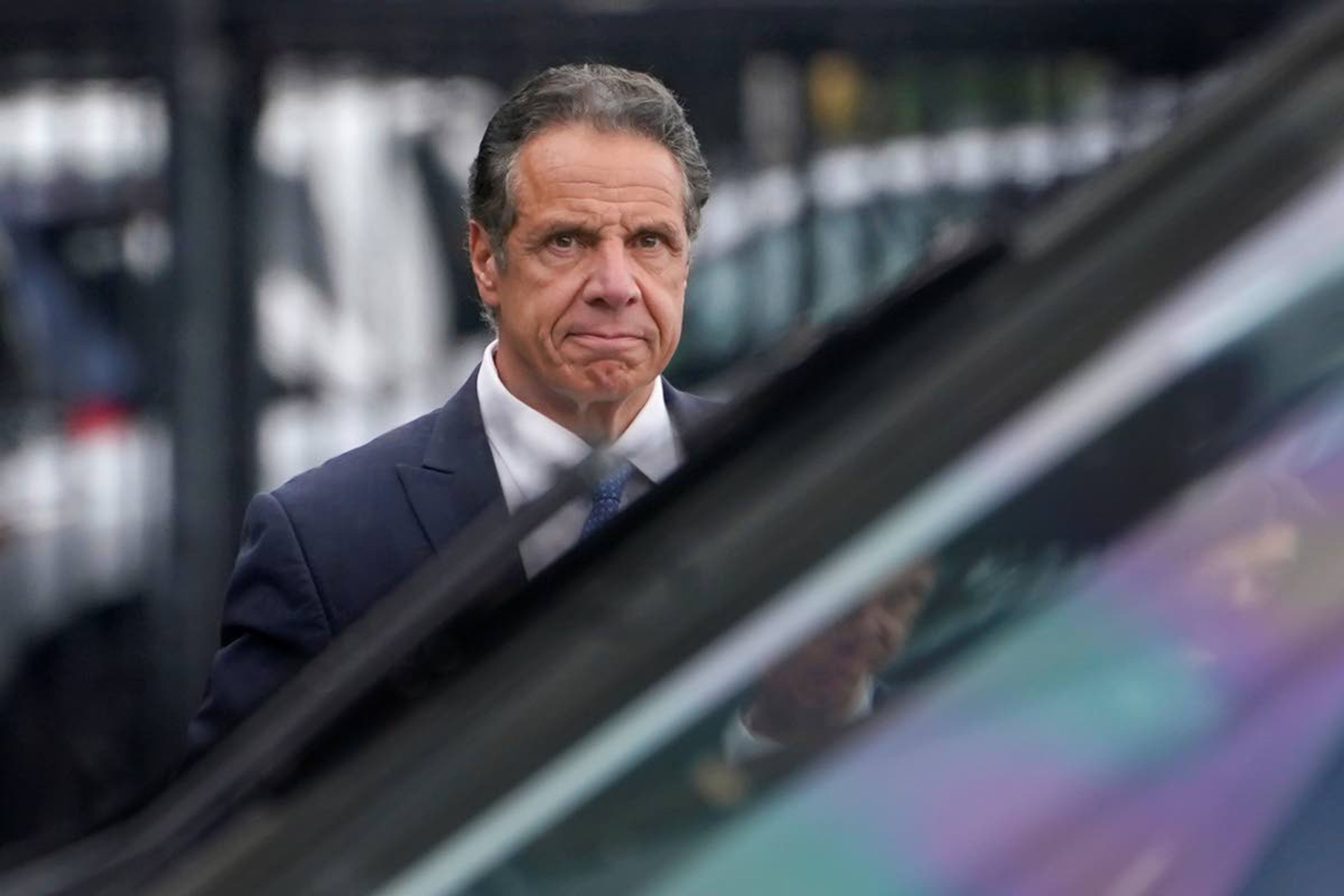 New York Gov. Andrew Cuomo prepares to board a helicopter after announcing his resignation, Tuesday, Aug. 10, 2021, in New York. Cuomo says he will resign over a barrage of sexual harassment allegations. The three-term Democratic governor's decision, which will take effect in two weeks, was announced Tuesday as momentum built in the Legislature to remove him by impeachment. (AP Photo/Seth Wenig)