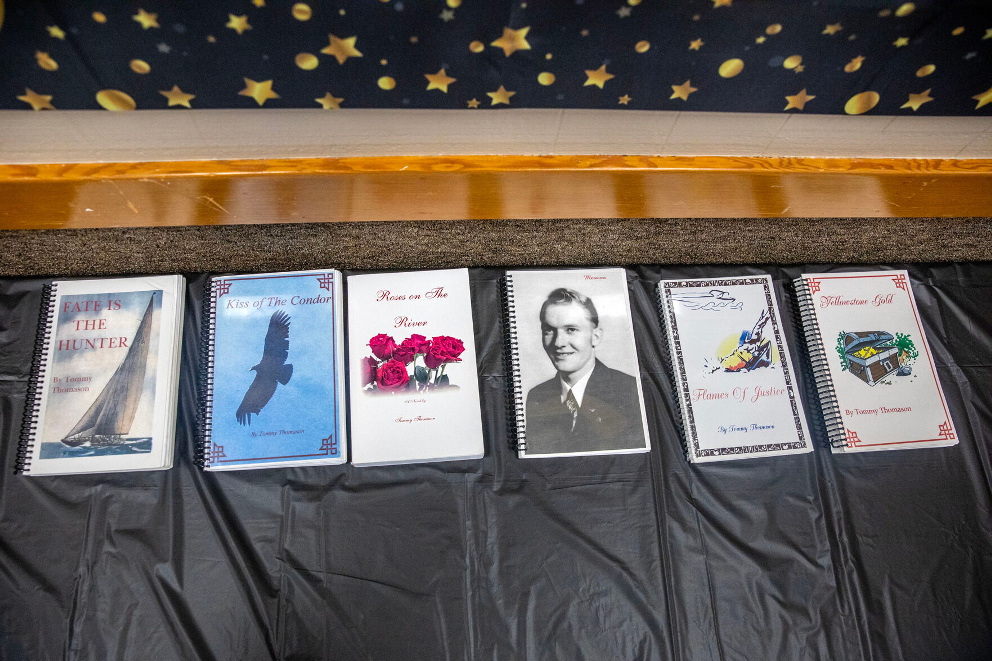 Books Floyd Thomason has written sit at a table during his birthday party Saturday at the Lewiston Community Center.