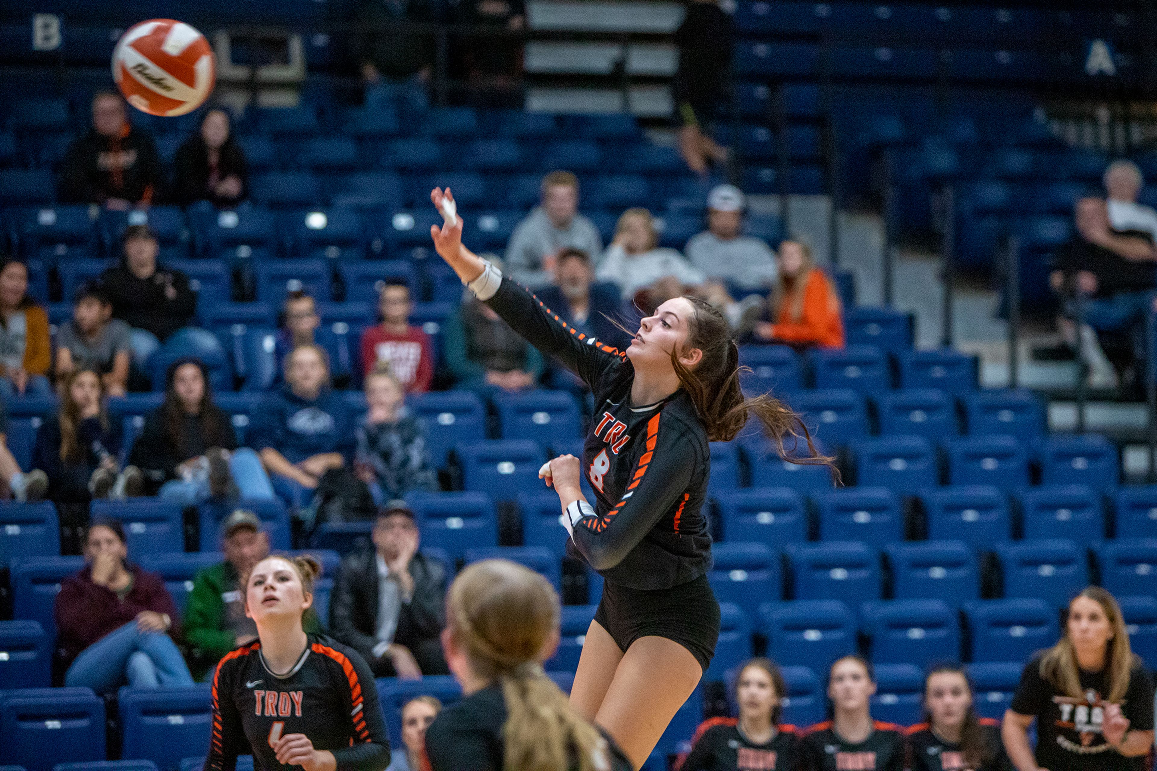 Troy High outside hitter Jolee Eckland spikes the ball back to Genesee High during the Idaho Class 1A Division I district volleyball tournament at the P1FCU Activity Center in Lewiston on Wednesday.