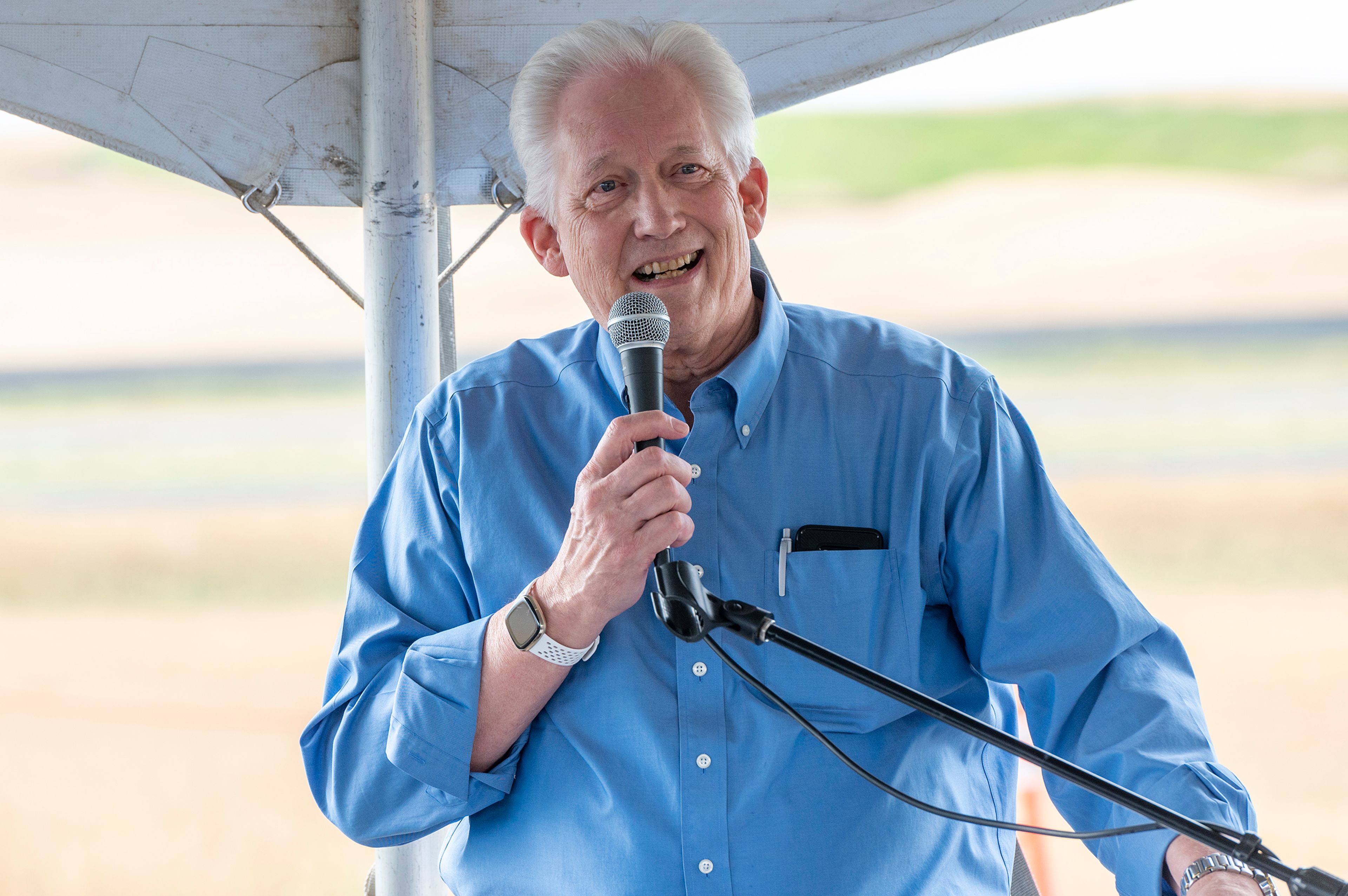 Pullman Mayor Glenn Johnson speaks to a crowd during a groundbreaking event for the new Pullman-Moscow Regional Airport terminal.