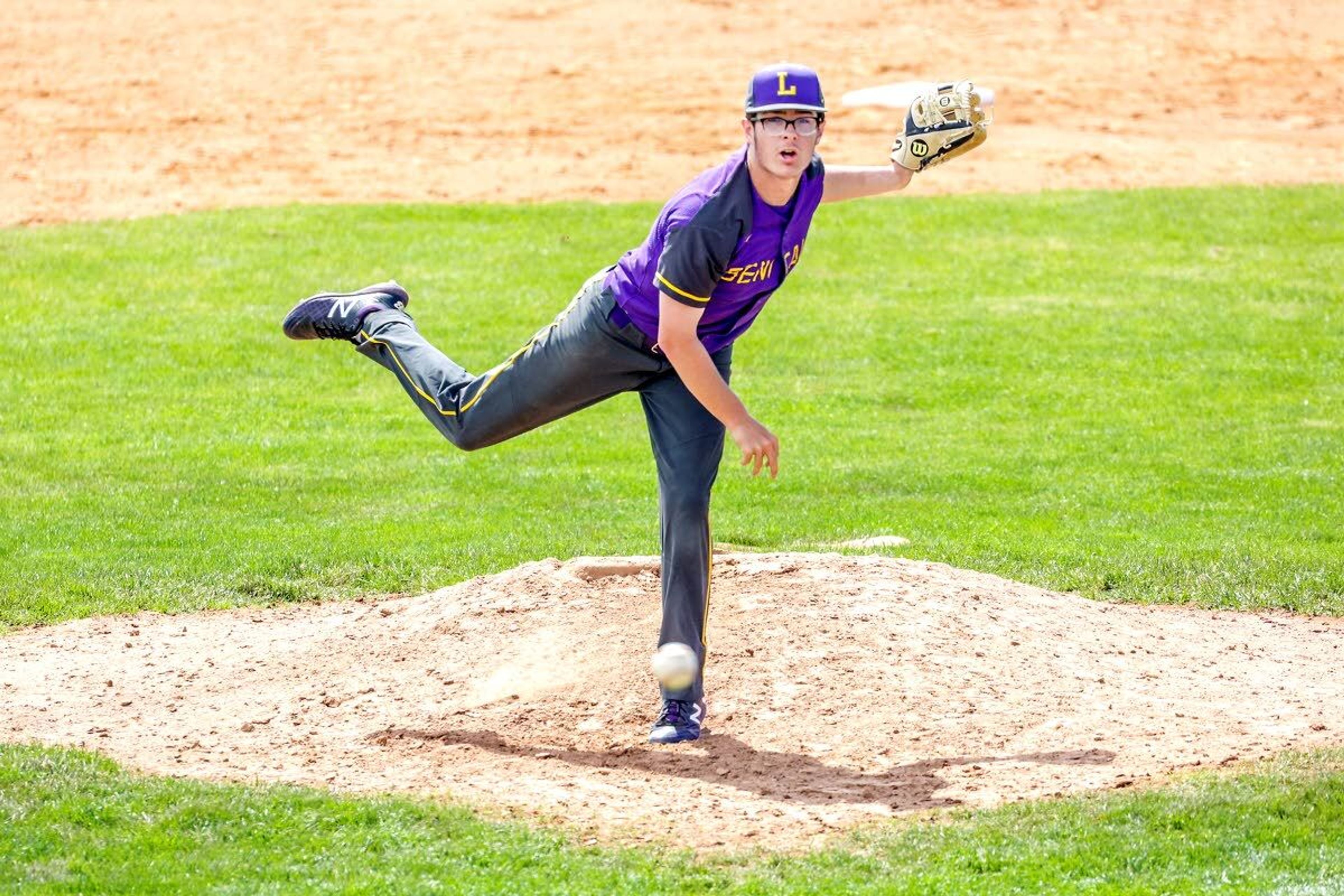 Lewiston’s Kayden Carpenter throws a pitch during Saturday’s Inland Empire League game against Moscow at Church Field.