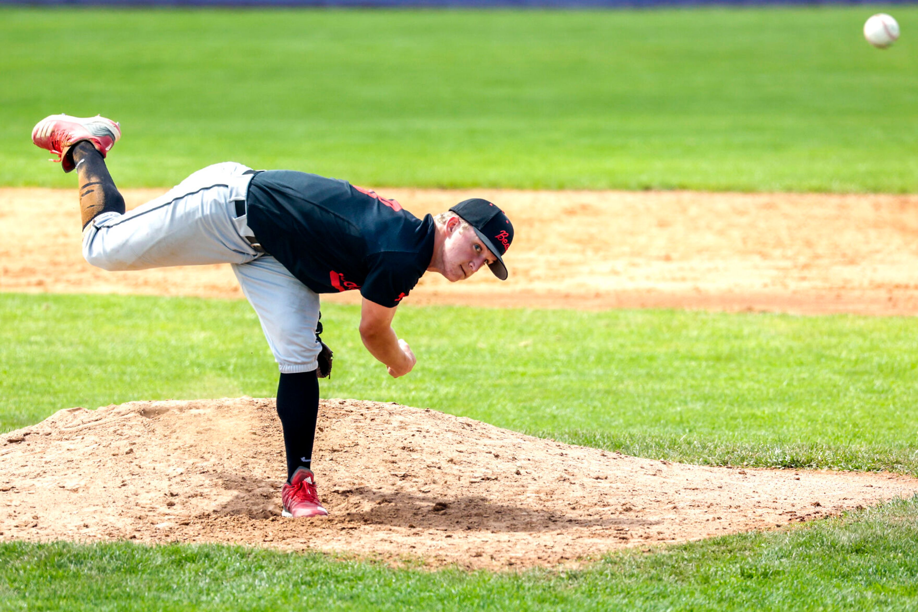 Moscow’s Chad Redinger throws a pitch in against Lewiston at Church Field on Saturday. Lewiston defeated Moscow 6-4.