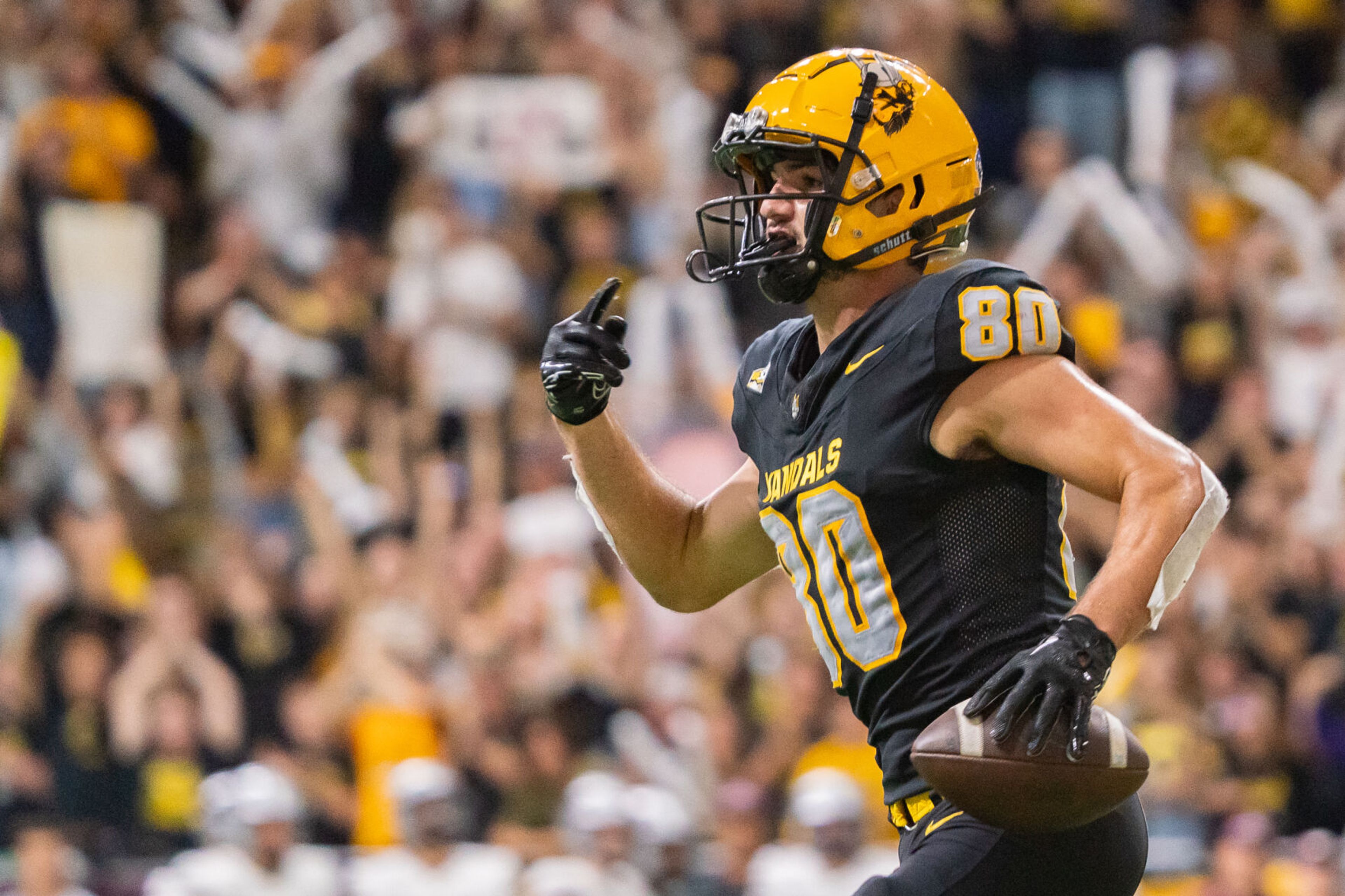 Idaho wide receiver Hayden Hatten (80) celebrates after scoring on a 2-point conversion during a game against Montana on Oct. 14 at the P1FCU Kibbie Dome on in Moscow.