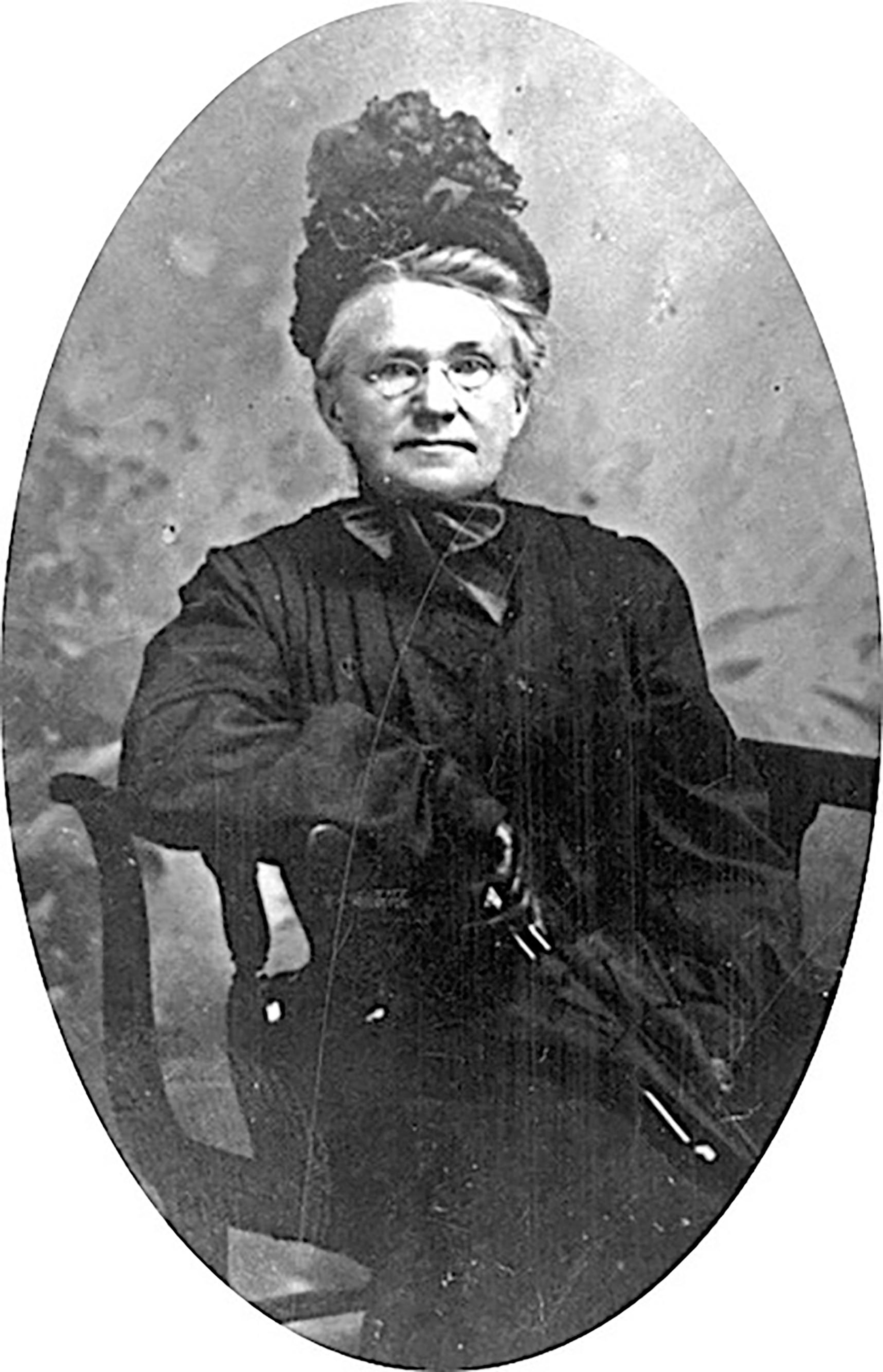 Mary Frances White, circa 1905. Her intricate clothing may indicate her financial status, or her skill with needlework.