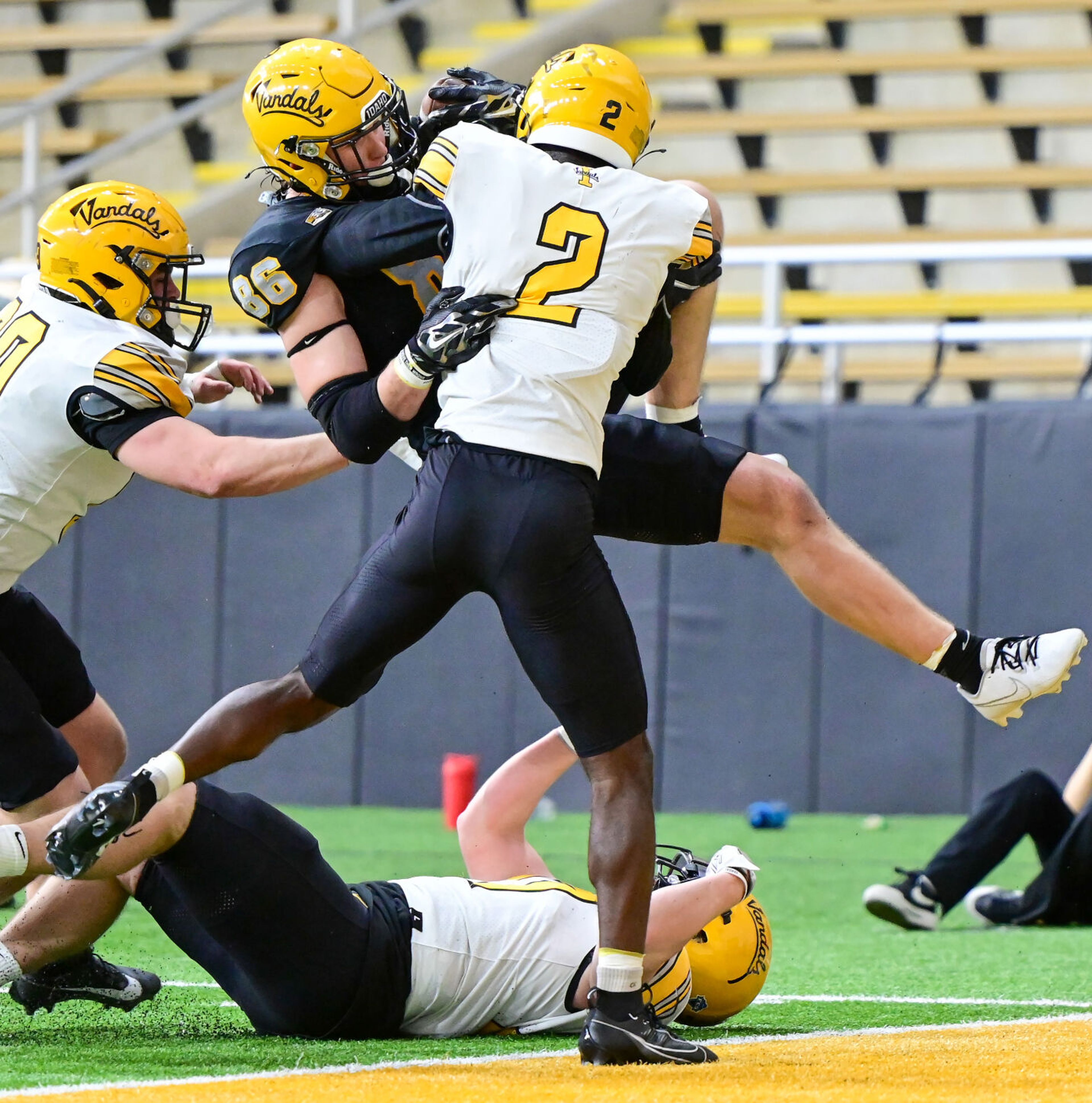 Vandals tight end Mason Mini (86) collides with defensive back Abraham Williams (2) as Mini crosses into the end zone for a touchdown during the annual spring game Friday at the P1FCU Kibbie Dome in Moscow.