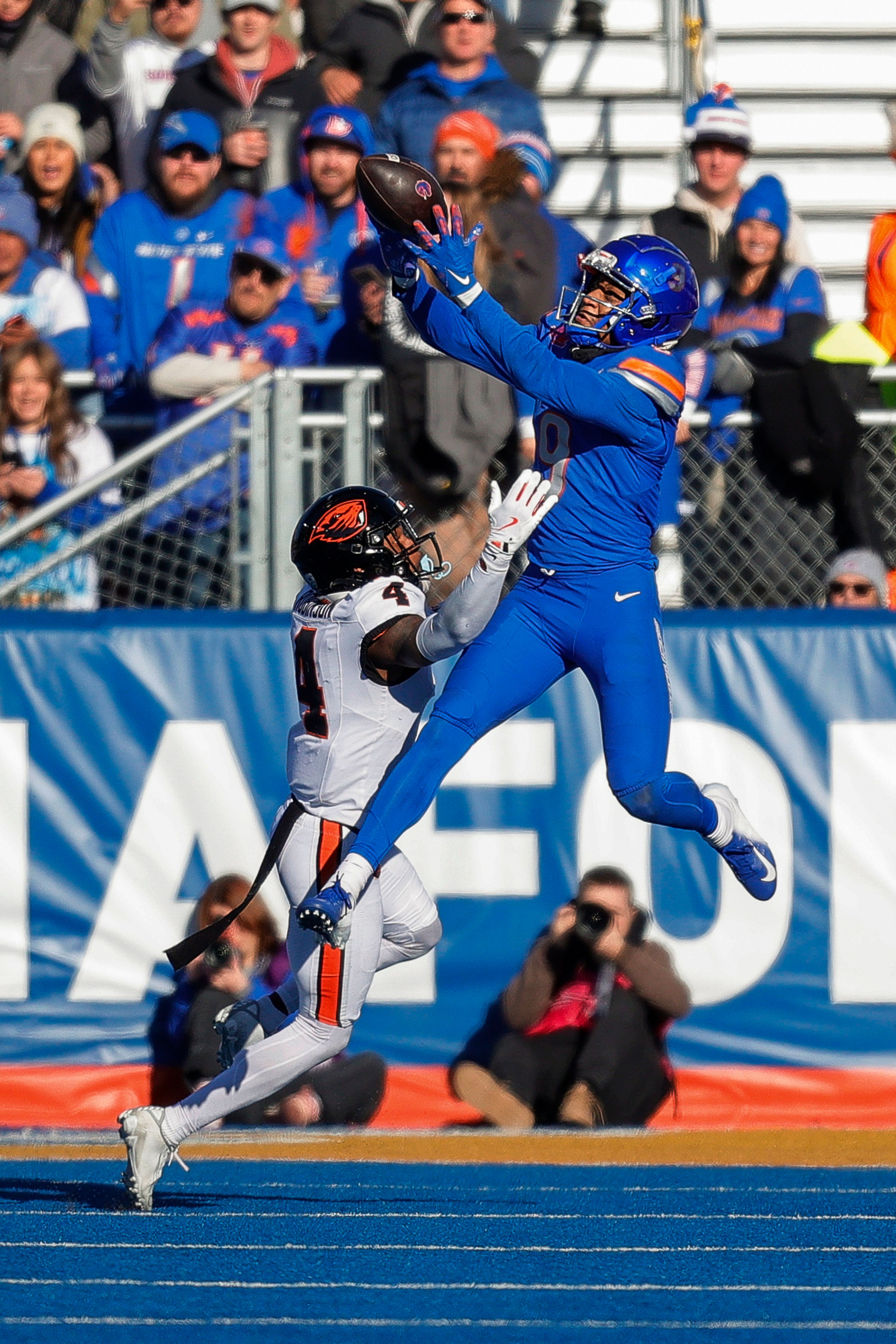 Boise State wide receiver Cameron Camper (9) goes up over Oregon State defensive back Jaden Robinson (4) for a reception late in the first half of an NCAA college football game, Friday, Nov. 29, 2024, in Boise, Idaho. (AP Photo/Steve Conner)