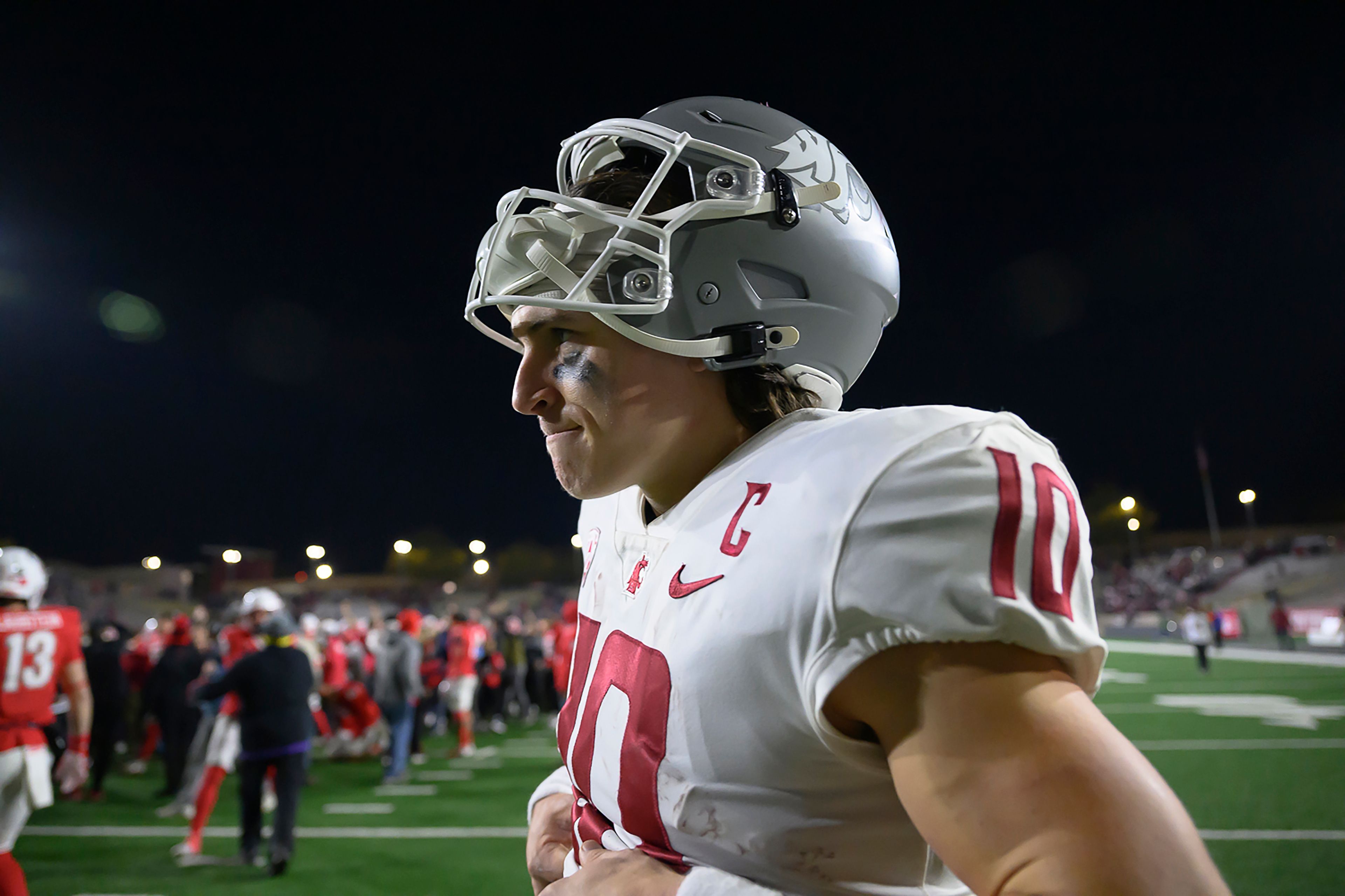 Washington State quarterback John Mateer walks off the field after losing to New Mexico during a game Saturday in Albuquerque, N.M.