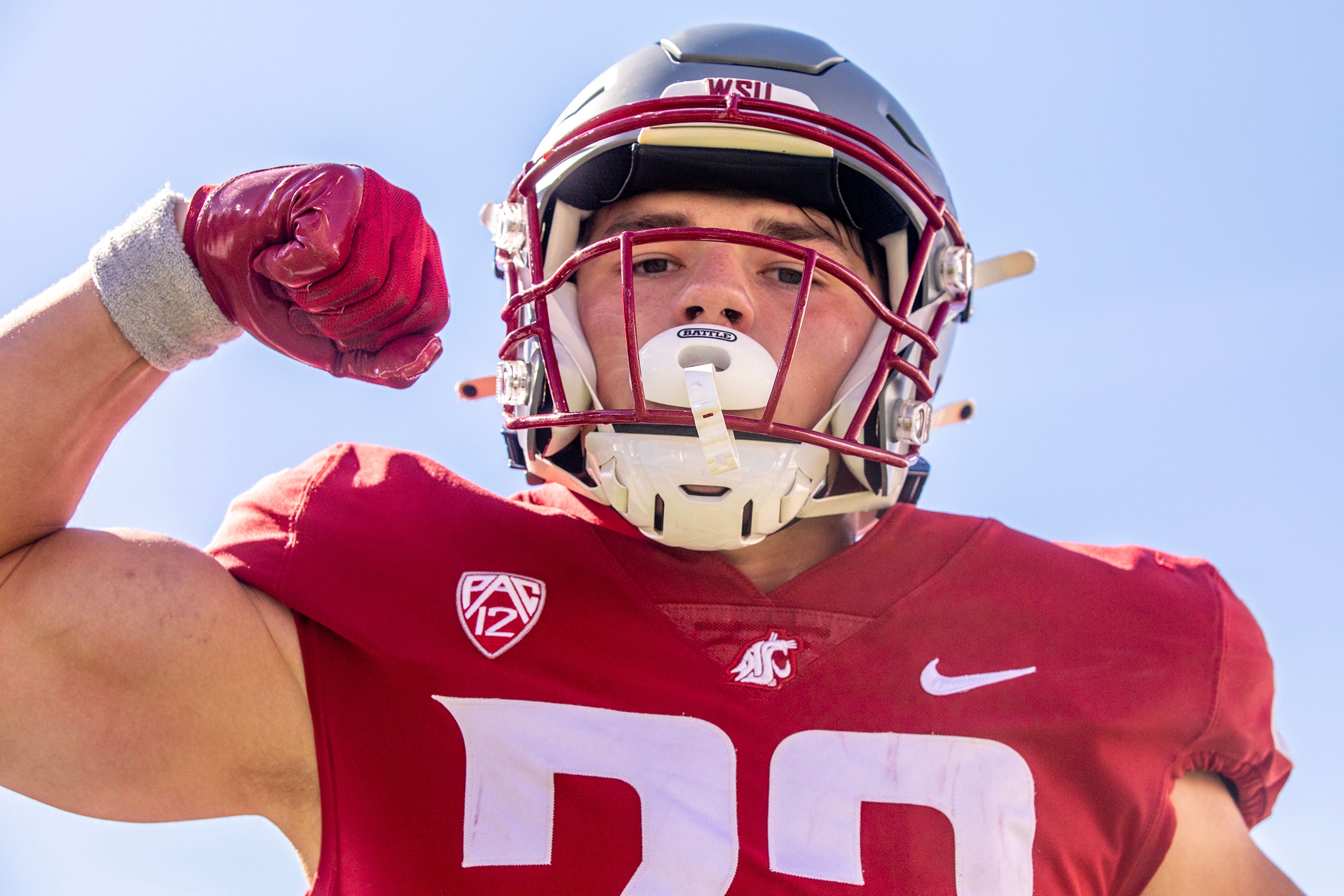 Washington State tight end Trey Leckner flexes after he scored a touchdown against Portland State on Aug. 31 at Gesa Field in Pullman.