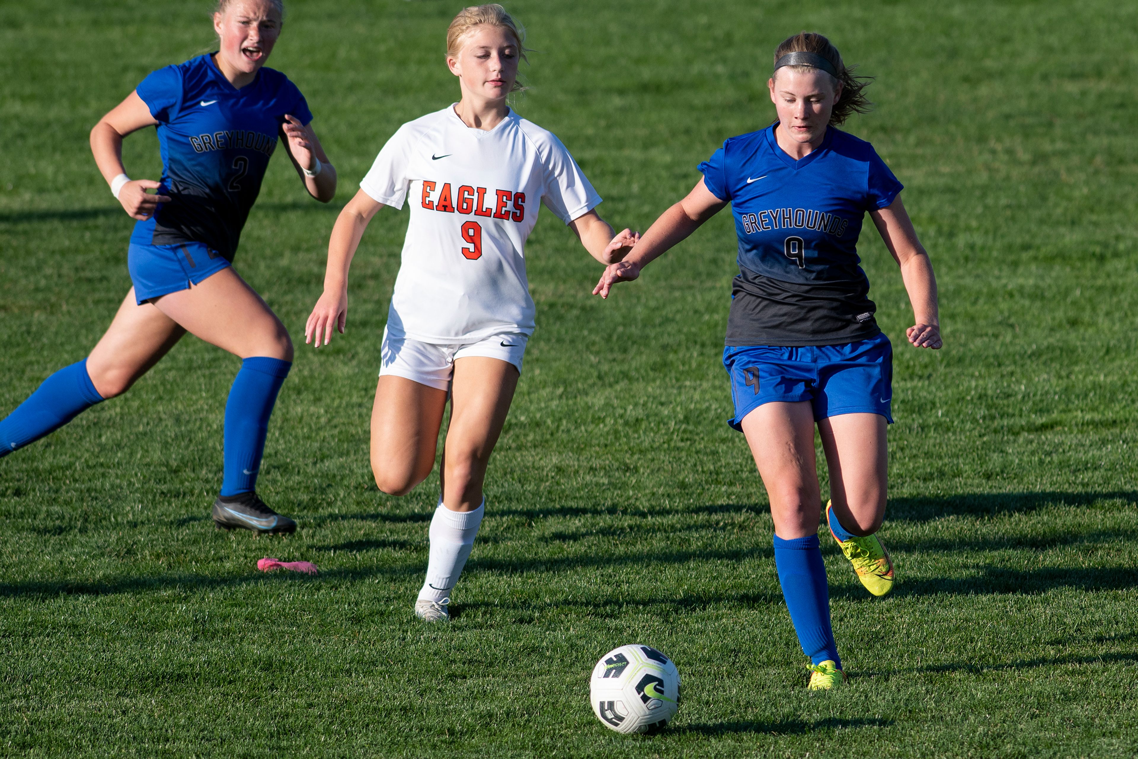 Pullman’s Aubree Cobos (9) chases the ball upfield against West Valley’s Claire Busse (9) during a Class 2A Greater Spokane League game at Pullman High School on Tuesday.