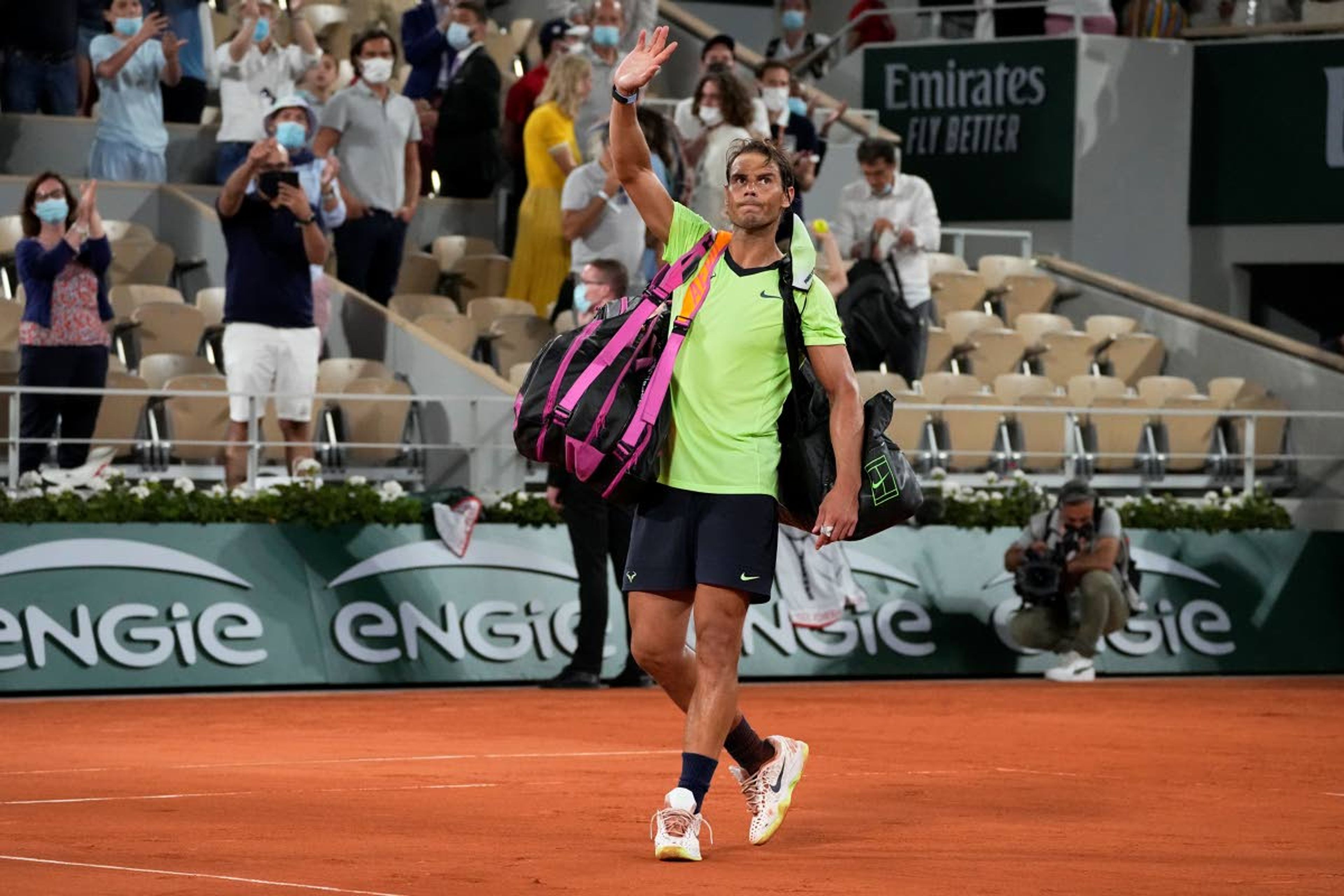 Associated PressSpain’s Rafael Nadal waves after losing to Serbia’s Novak Djokovic in their semifinal match of the French Open tennis tournament at the Roland Garros stadium Friday in Paris.