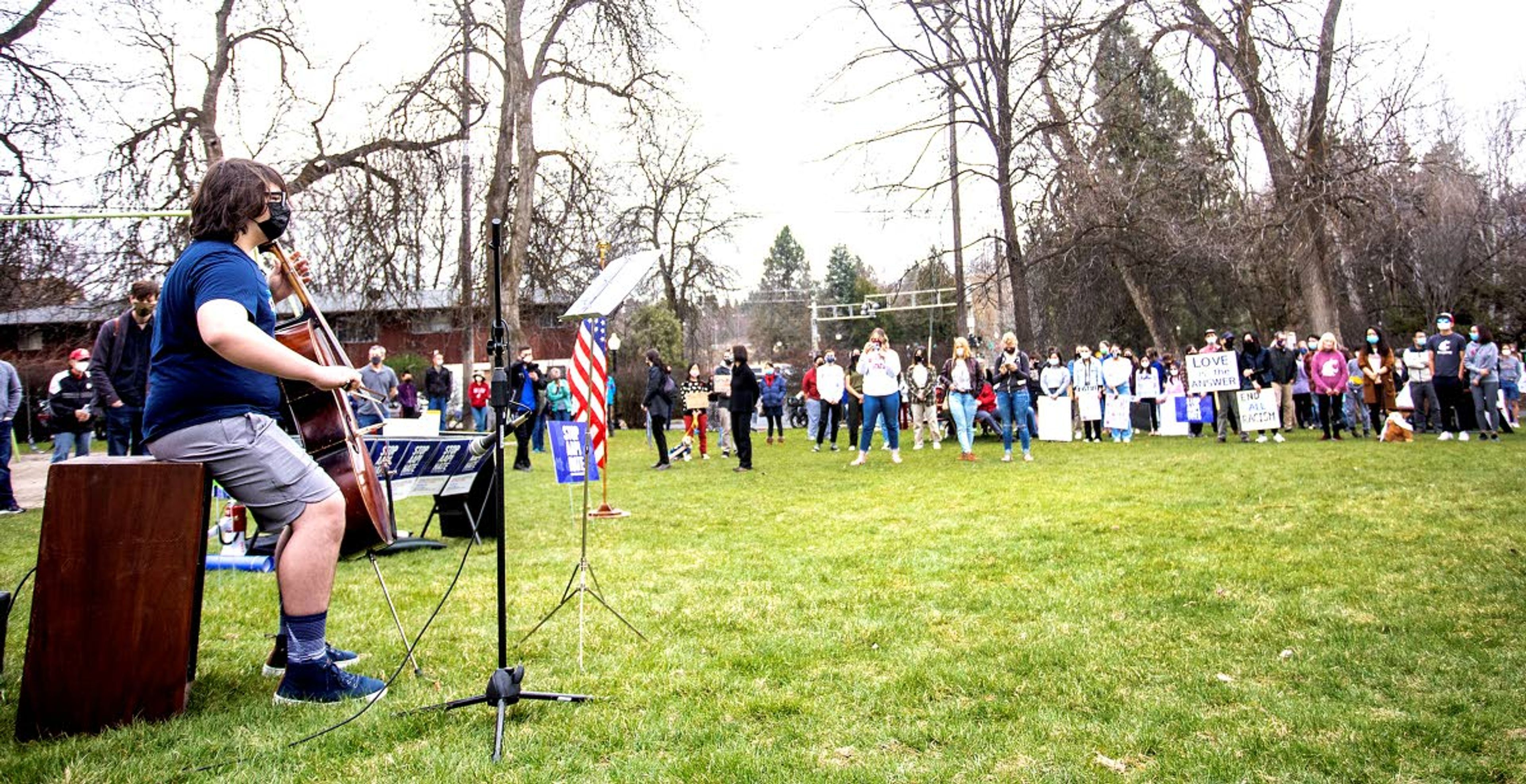 Emrik Gollnick, 15, plays the cello during the "Stop AAPI Hate on the Palouse" rally in Pullman on Saturday.