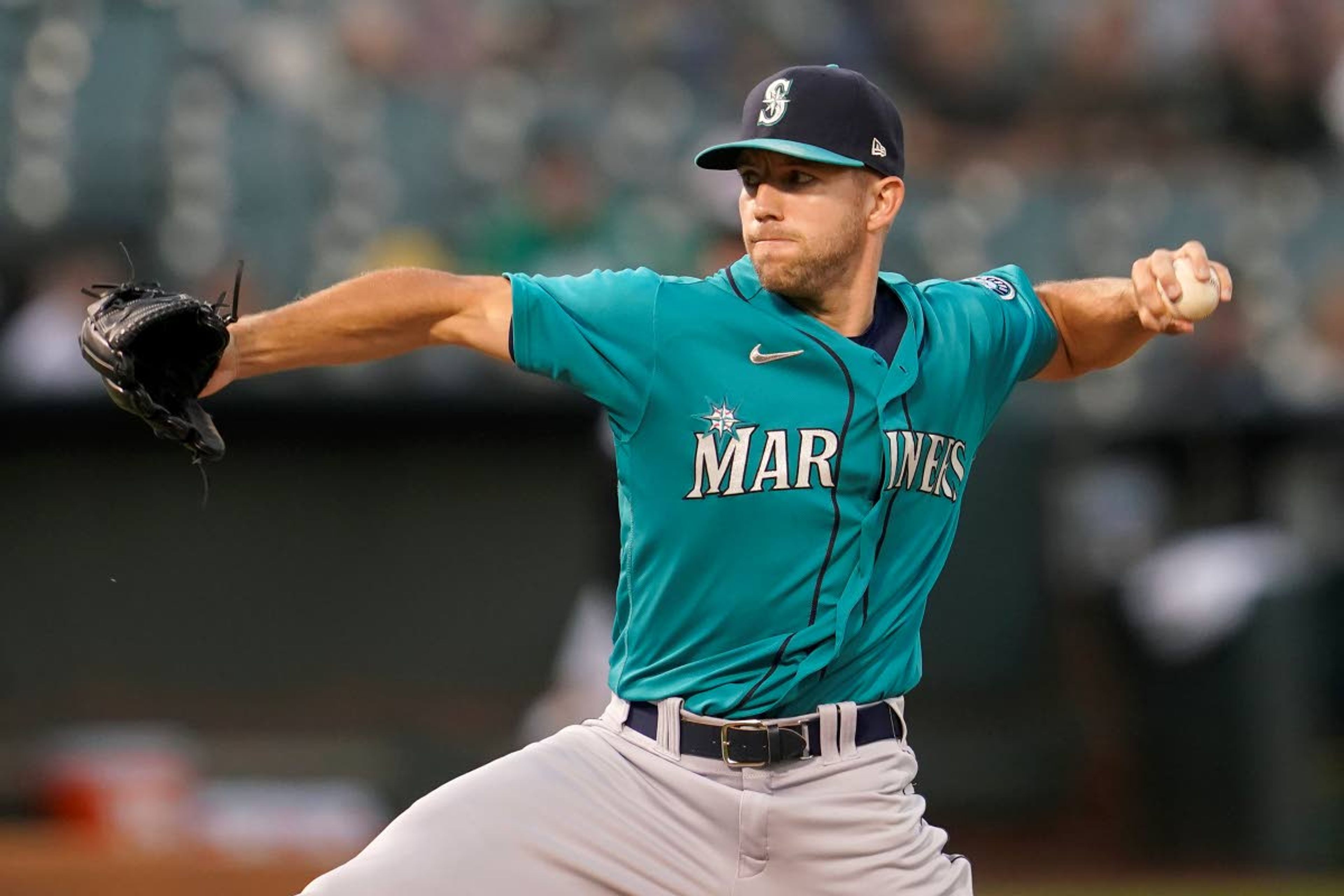 Seattle Mariners' Tyler Anderson pitches against the Oakland Athletics during the first inning of a baseball game in Oakland, Calif., Monday, Sept. 20, 2021. (AP Photo/Jeff Chiu)