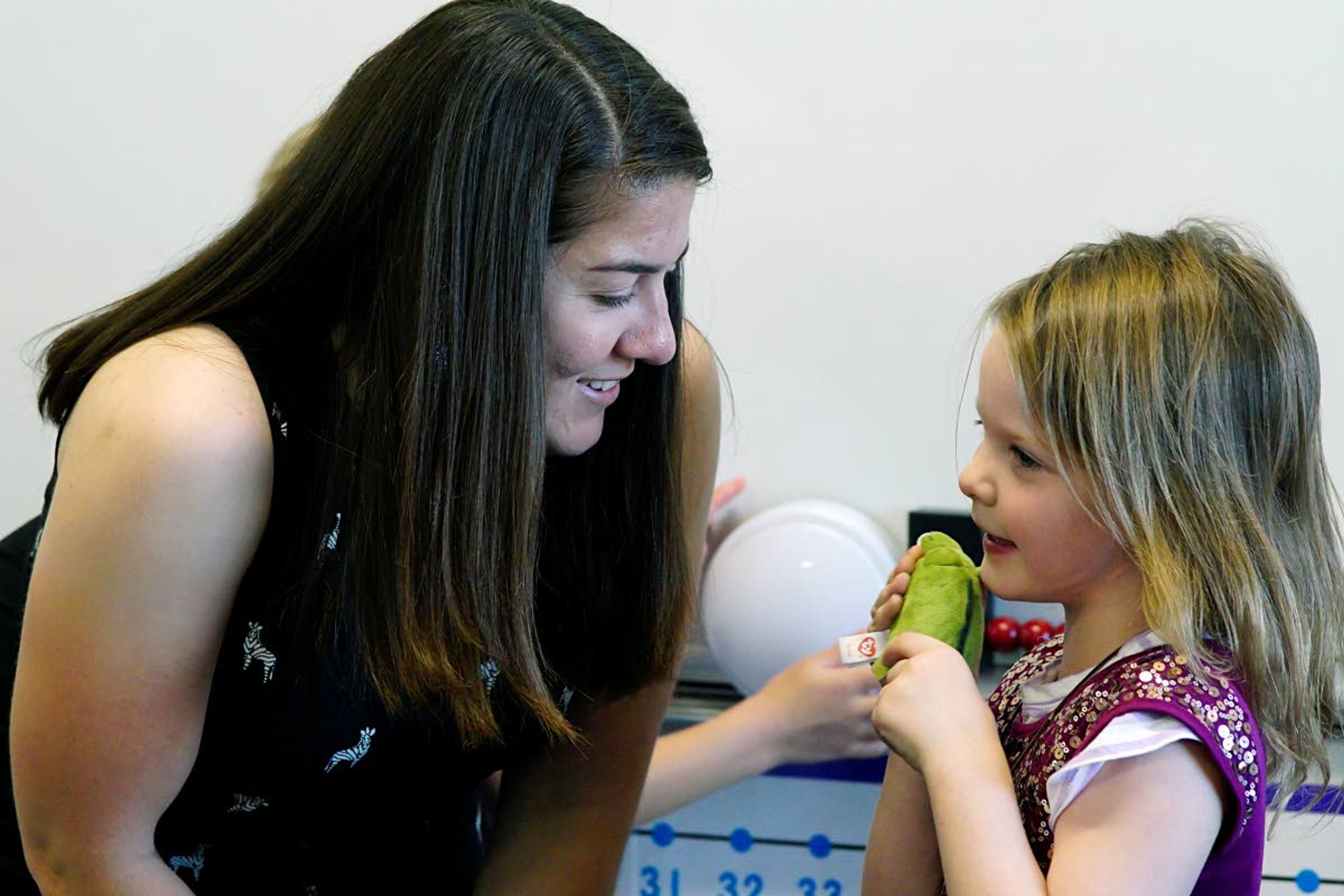 Teacher Alissa Klemencic talks with incoming first-grader Eliya Houffstutler during a back to school open house Monday at Palouse Prairie Charter School in Moscow.