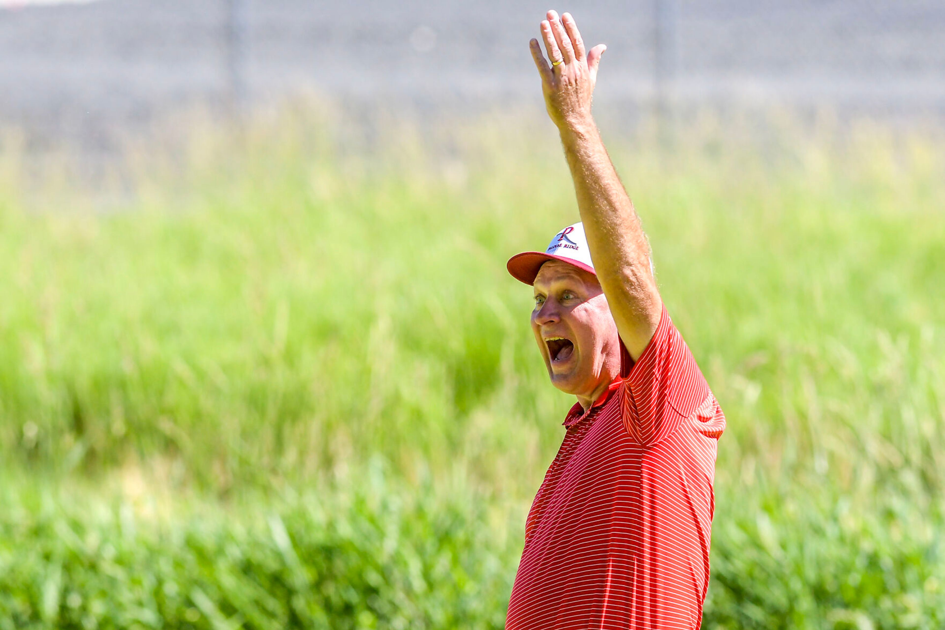 Kevin Peterson reacts after his ball falls in after hanging out on the rim long enough for Peterson to walk over to the hole for his next putt at the annual Moscow Elks Lodge Golf Club Sole Survivor tournament Thursday in Moscow.