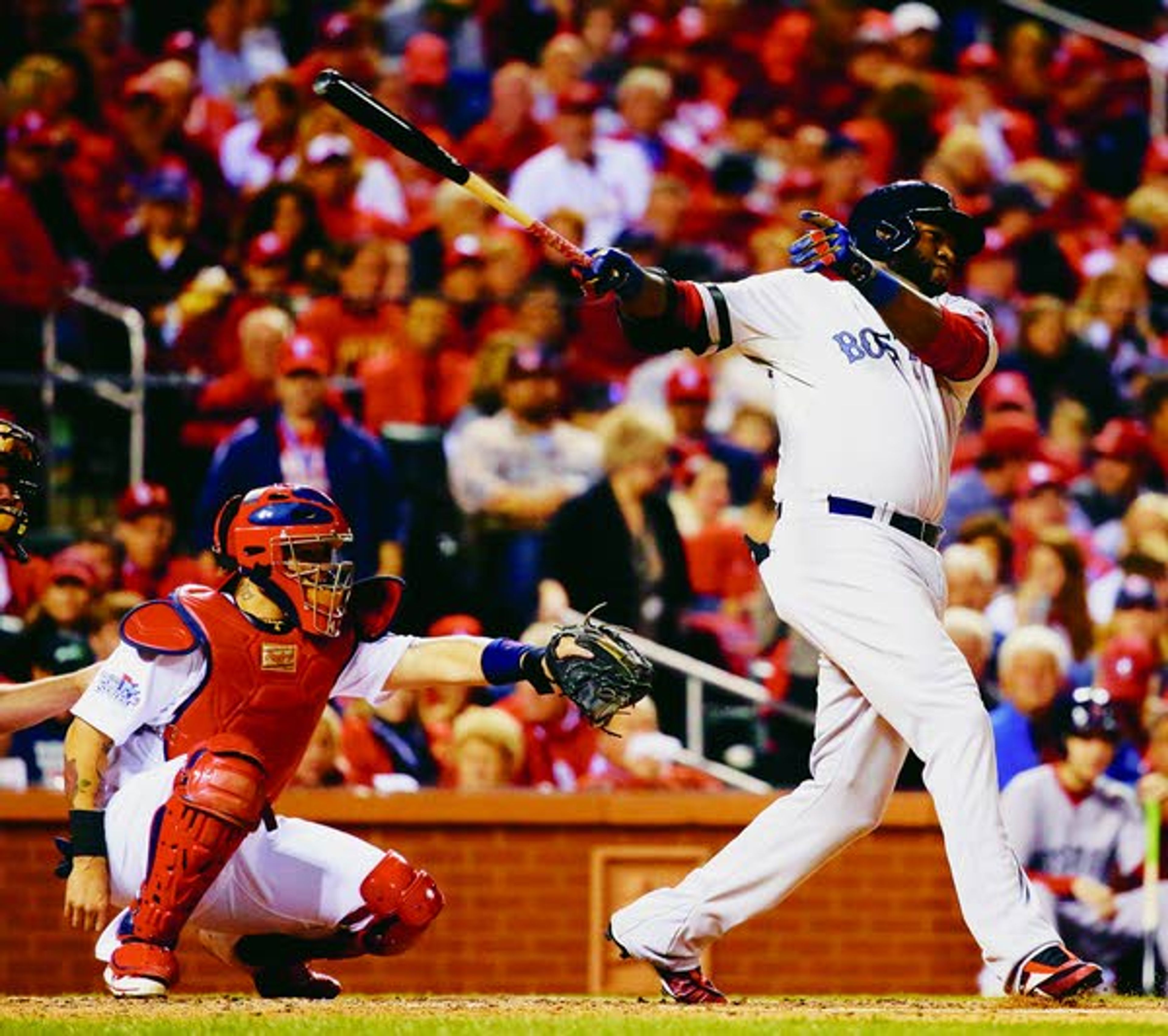 Red Sox’s David Ortiz hits a single during the fourth inning of Game 5 of the World Series against the Cardinals on Monday in St. Louis.