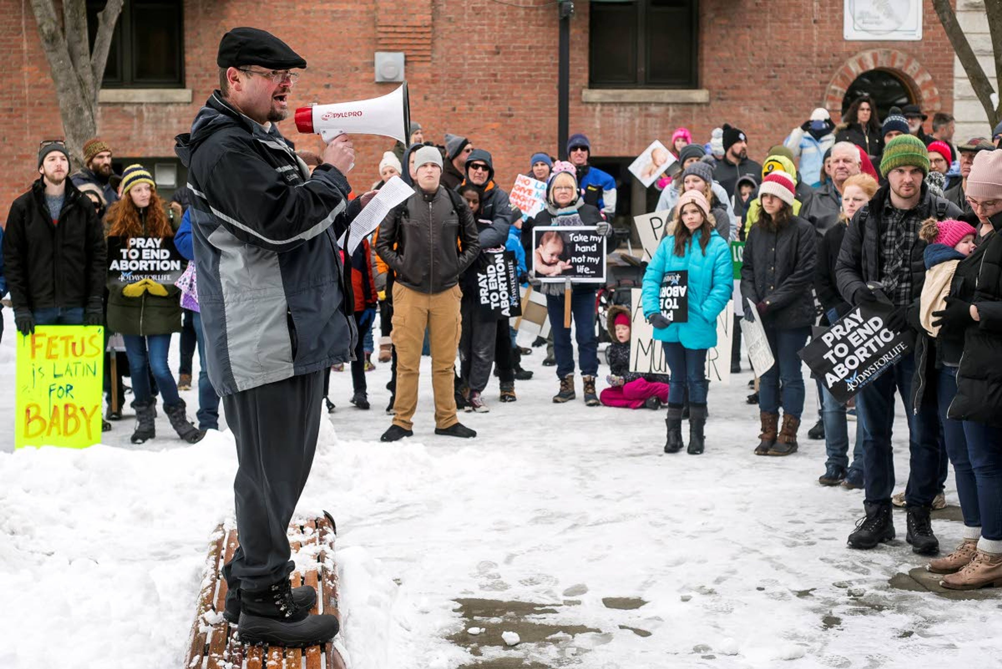 Augustana Lutheran Church pastor Jonathon Krenz, of Moscow, leads a rally at Friendship Square during the 2020 March for Life in Moscow on Saturday.