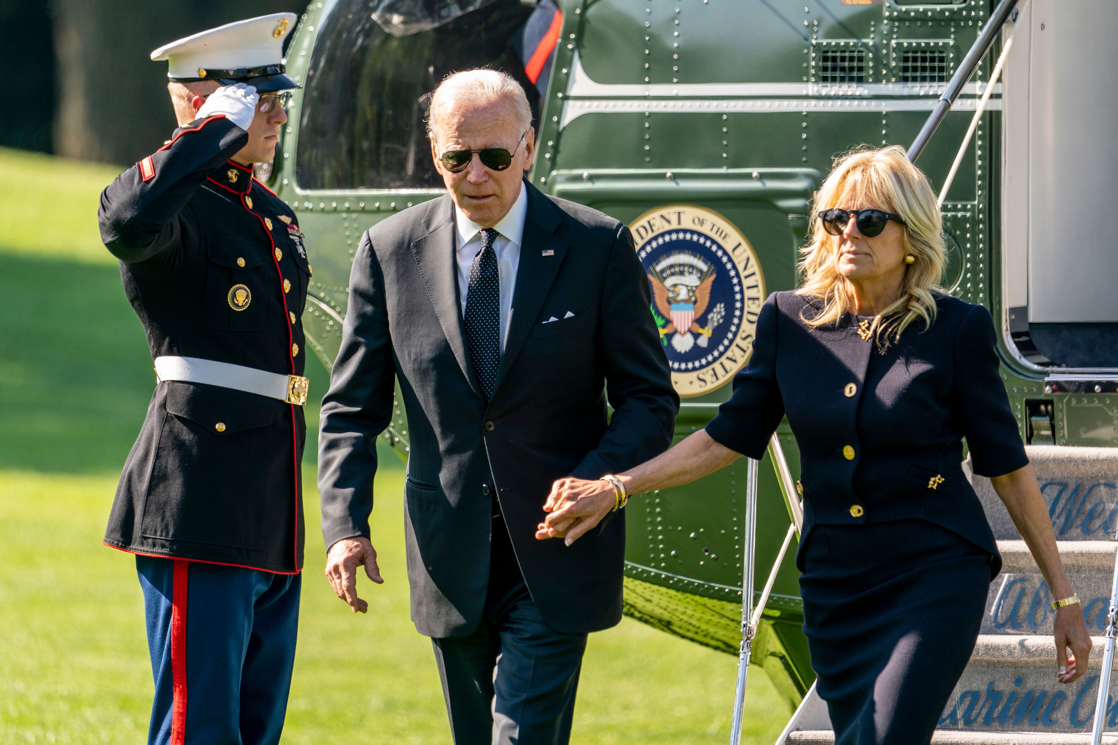 President Joe Biden and first lady Jill Biden arrive on the South Lawn of the White House in Washington, Monday, May 30, 2022, after returning from Wilmington, Del. (AP Photo/Andrew Harnik)