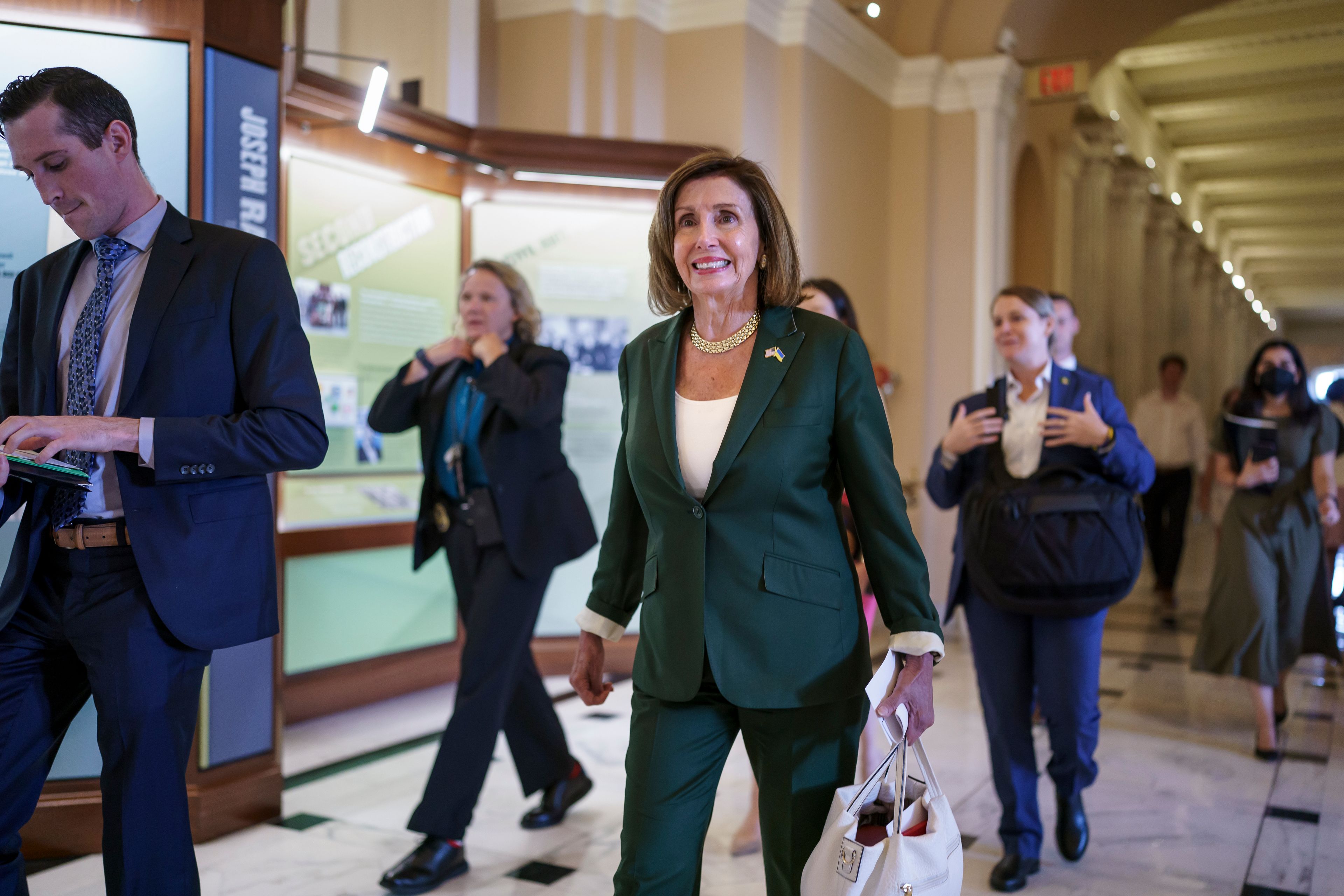 House Speaker Nancy Pelosi, D-Calif., walks to her office after the House aligned the bipartisan chips bill designed to encourage more semiconductor companies to build chip plants in the United States, at the Capitol in Washington, Thursday, July 28, 2022. (AP Photo/J. Scott Applewhite)