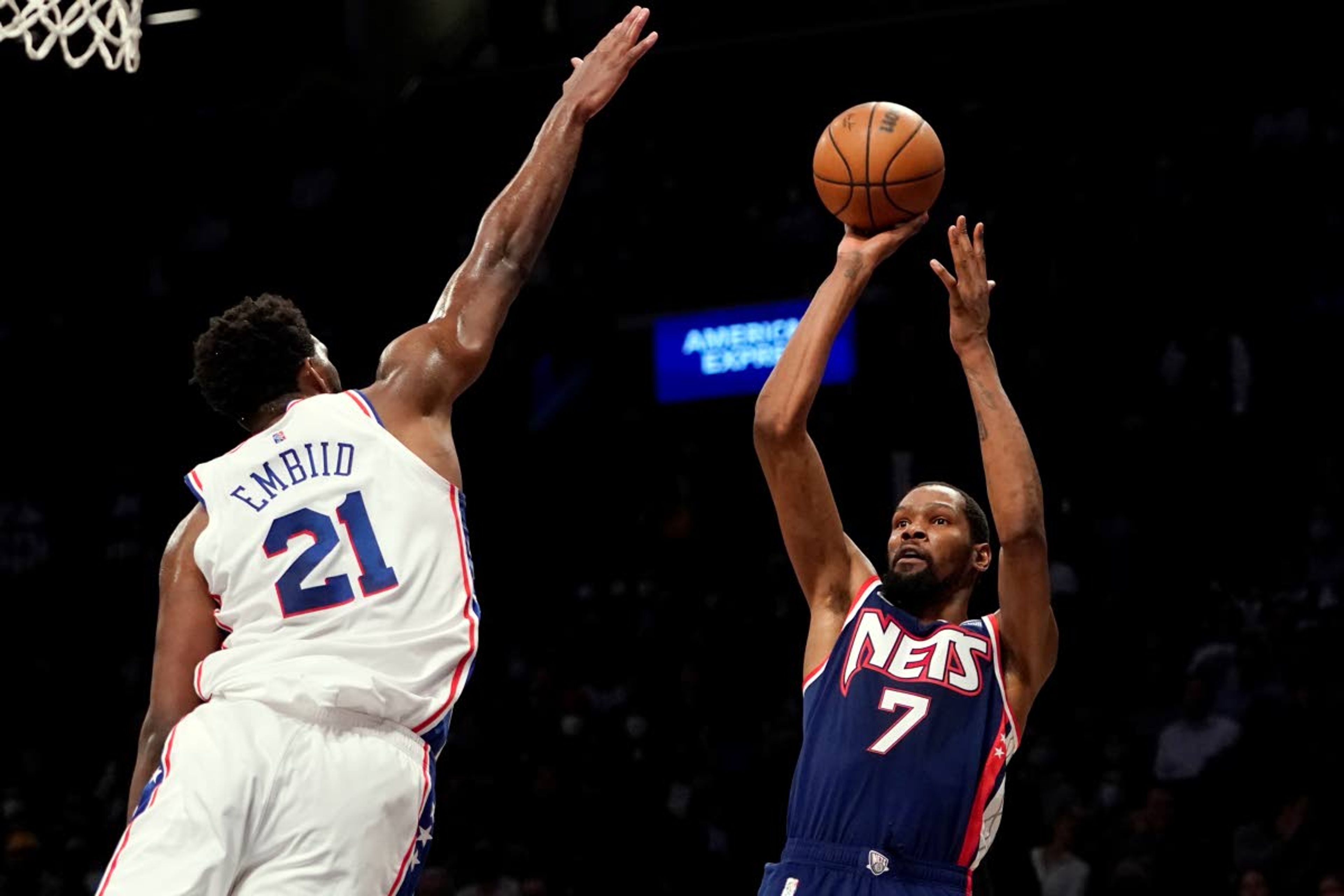 Associated PressNets forward Kevin Durant shoots over 76ers center Joel Embiid (21) during the second half of a game Dec. 16 in New York. The Nets won 114-105.