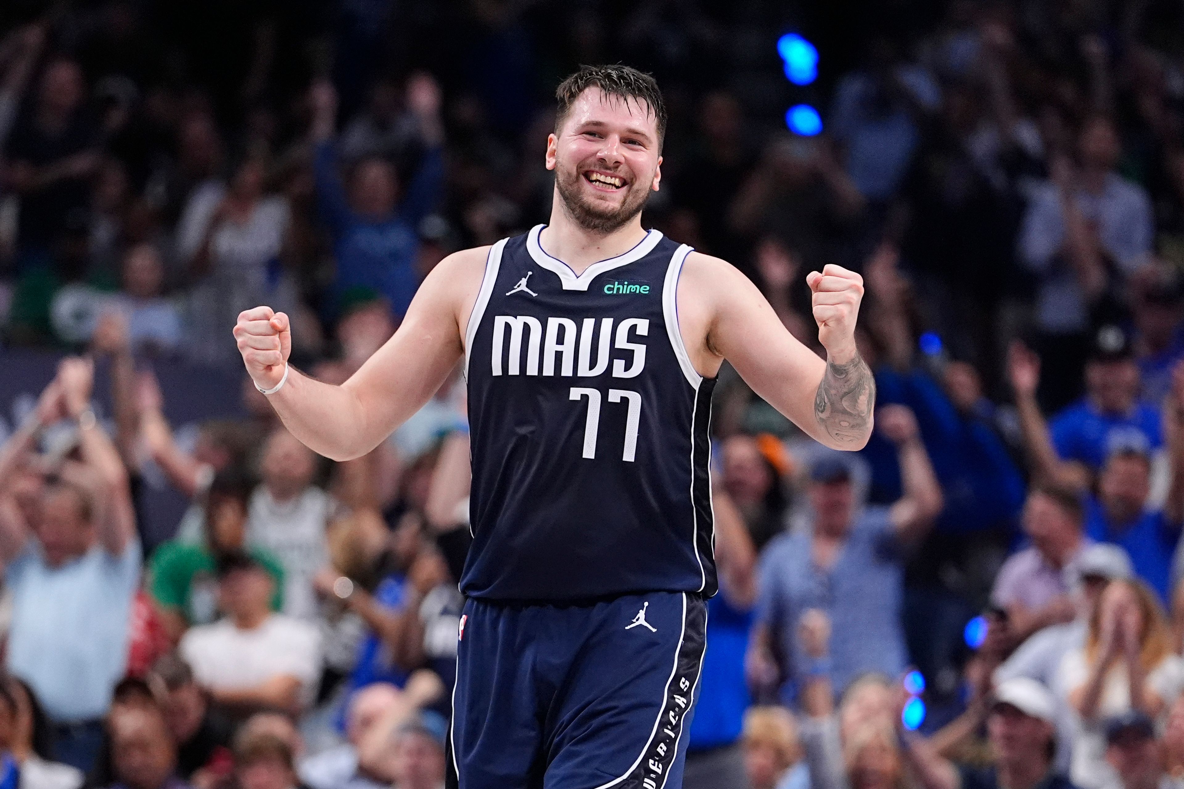 Mavericks guard Luka Doncic (77) reacts after a play during the first half of Game 4 of the NBA Finals on Friday in Dallas.