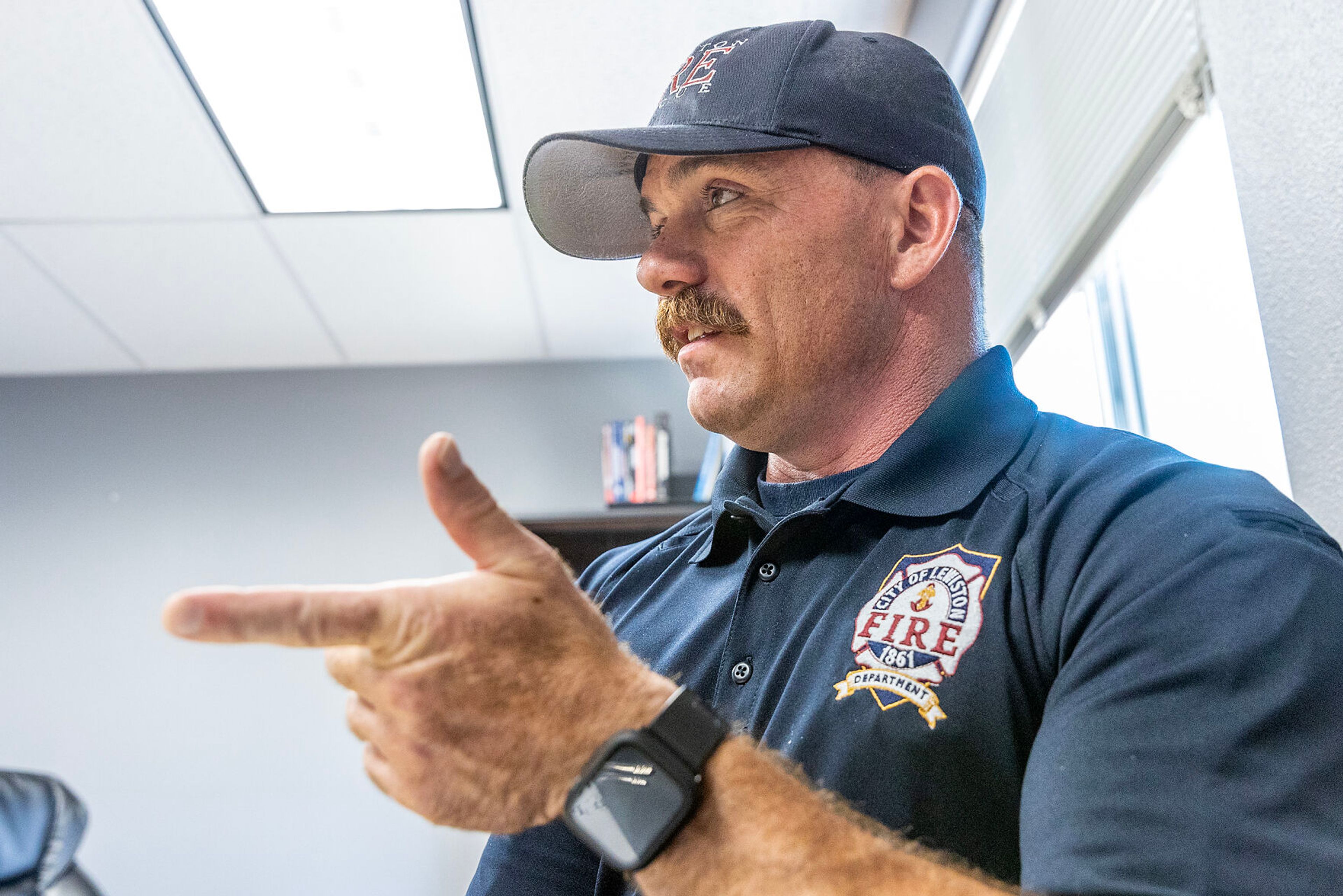 Richie Lucas discusses how to avoid heat illness and heat stroke at the Lewiston Fire Department Friday in Lewiston.