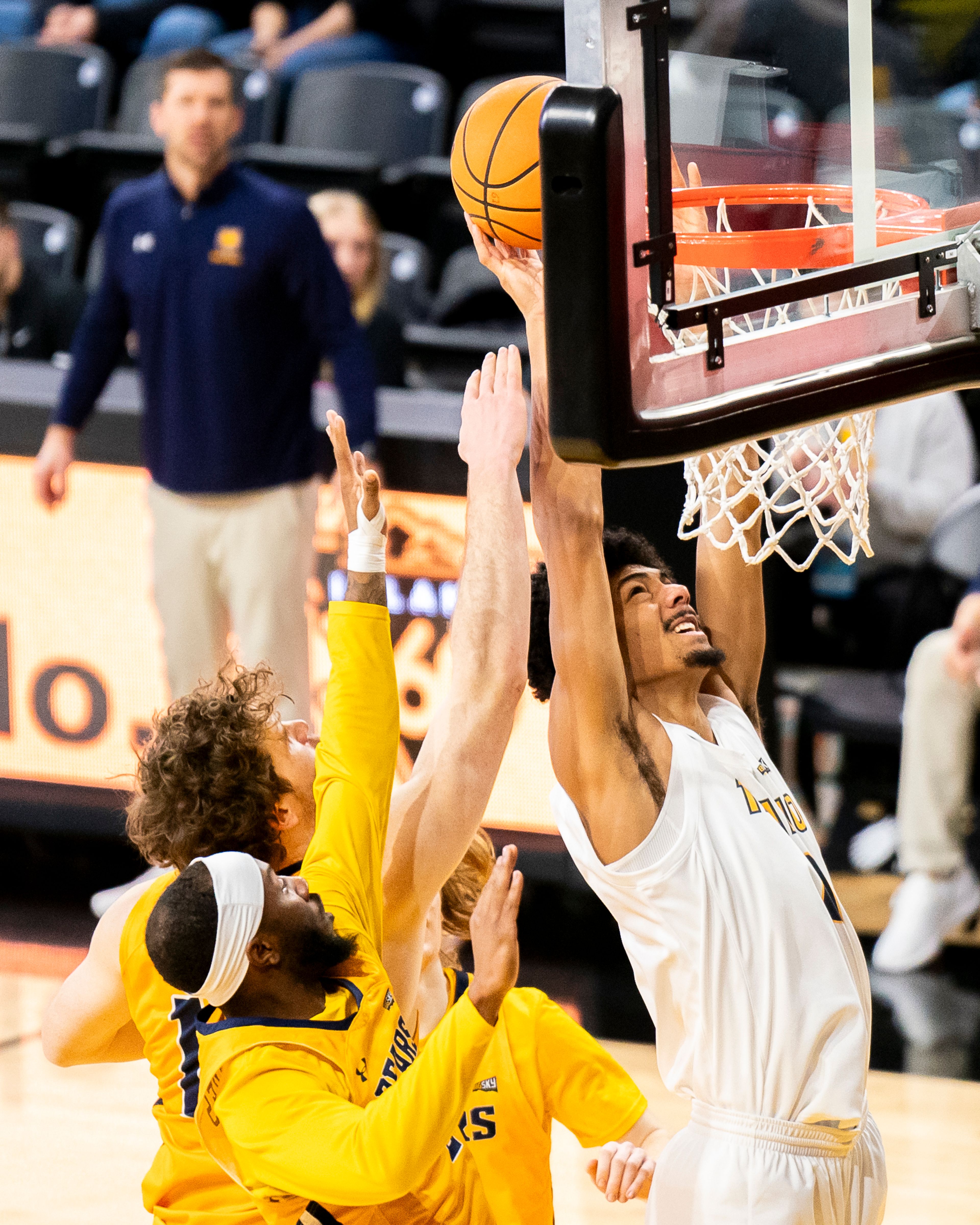 Idaho�s Julius Mims, right, goes up for a shot during a game against Northern Colorado on Saturday, Jan. 27, at ICCU Arena in Moscow. ,