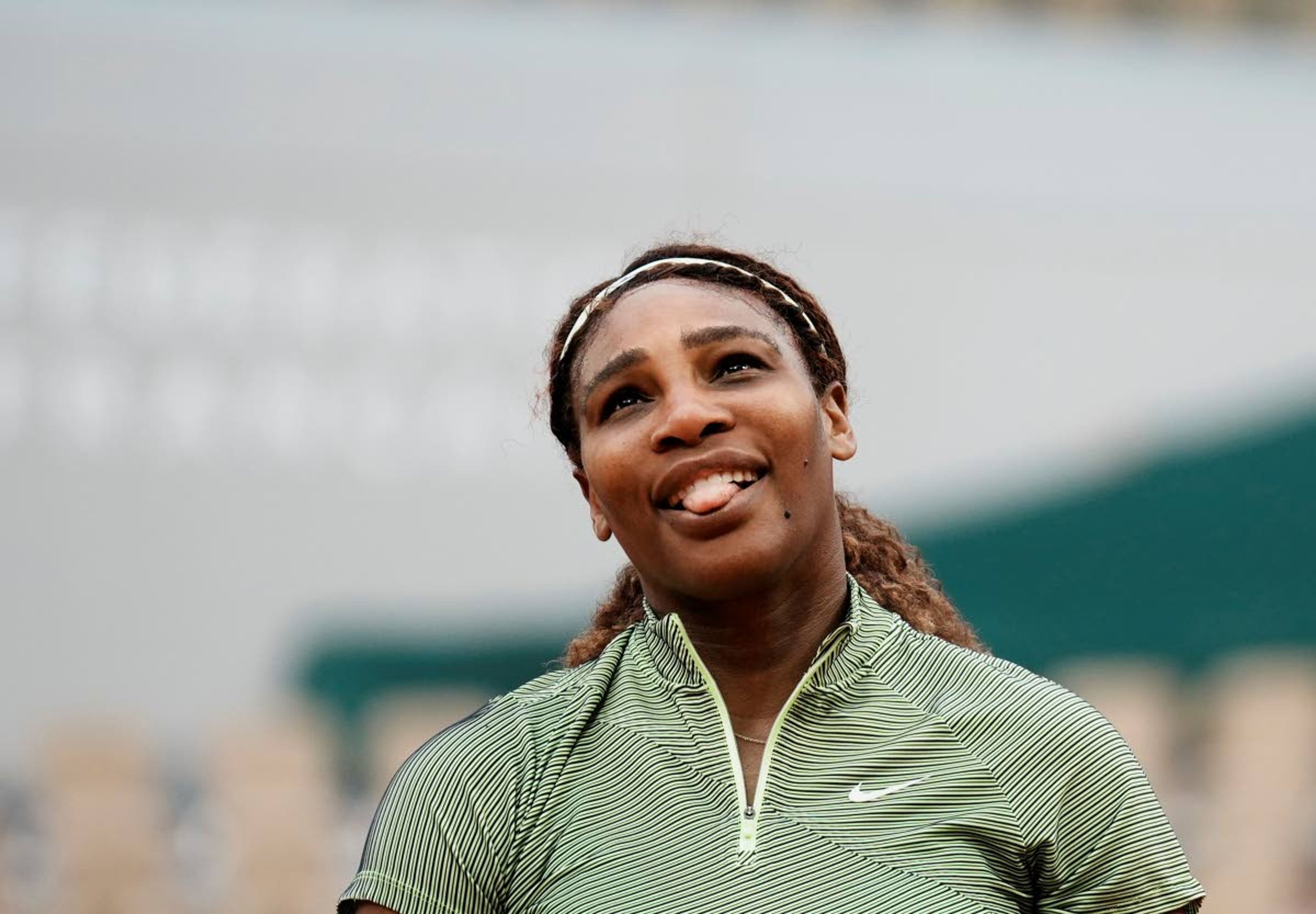 United States Serena Williams smiles after missing a point against Romania's Mihaela Buzarnescu during their second round match on day four of the French Open tennis tournament at Roland Garros in Paris, France, Wednesday, June 2, 2021. (AP Photo/Thibault Camus)